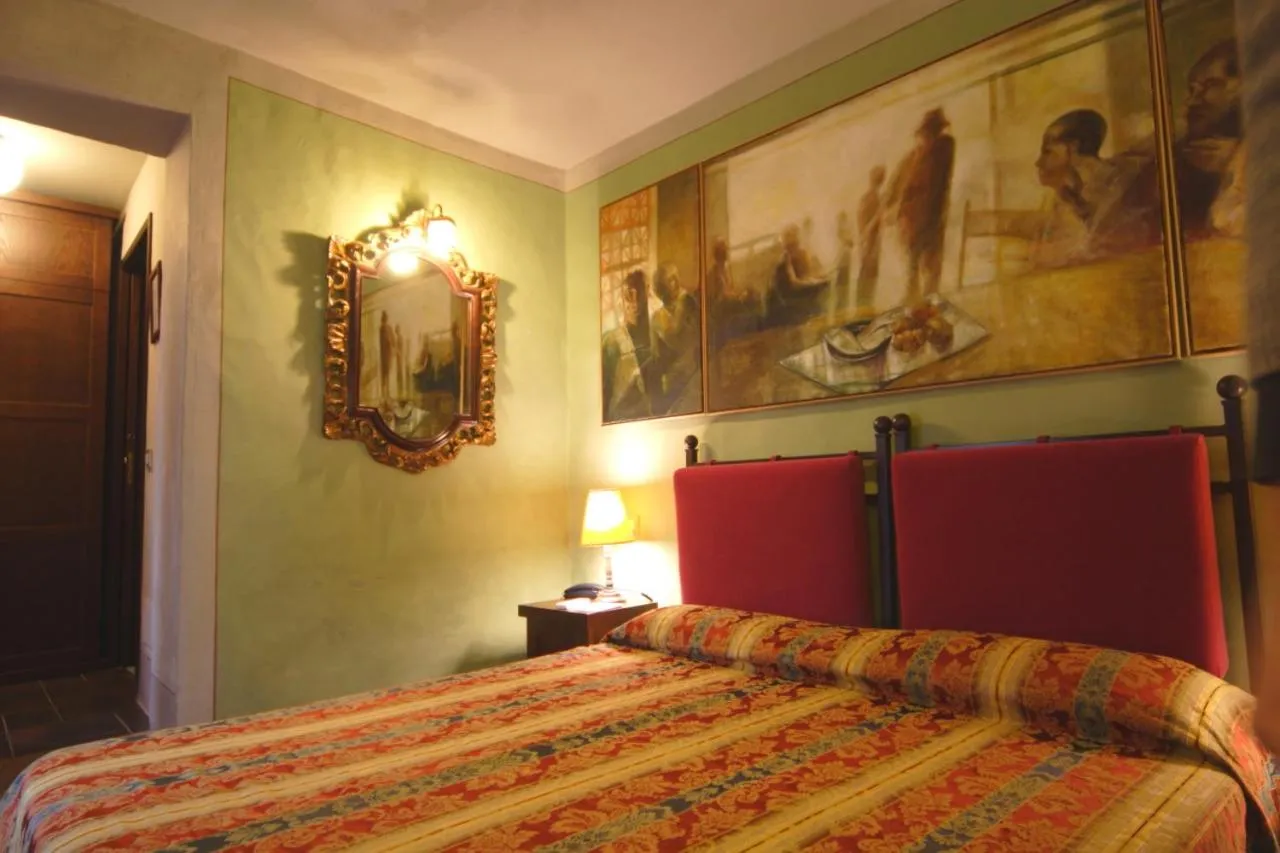 Photo of the whole room, Bed in Locanda Viani