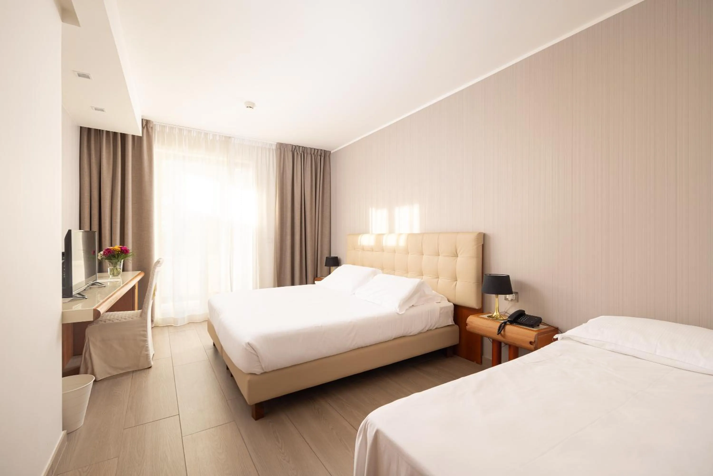 Bed in D'Aragona Lifestyle Hotel