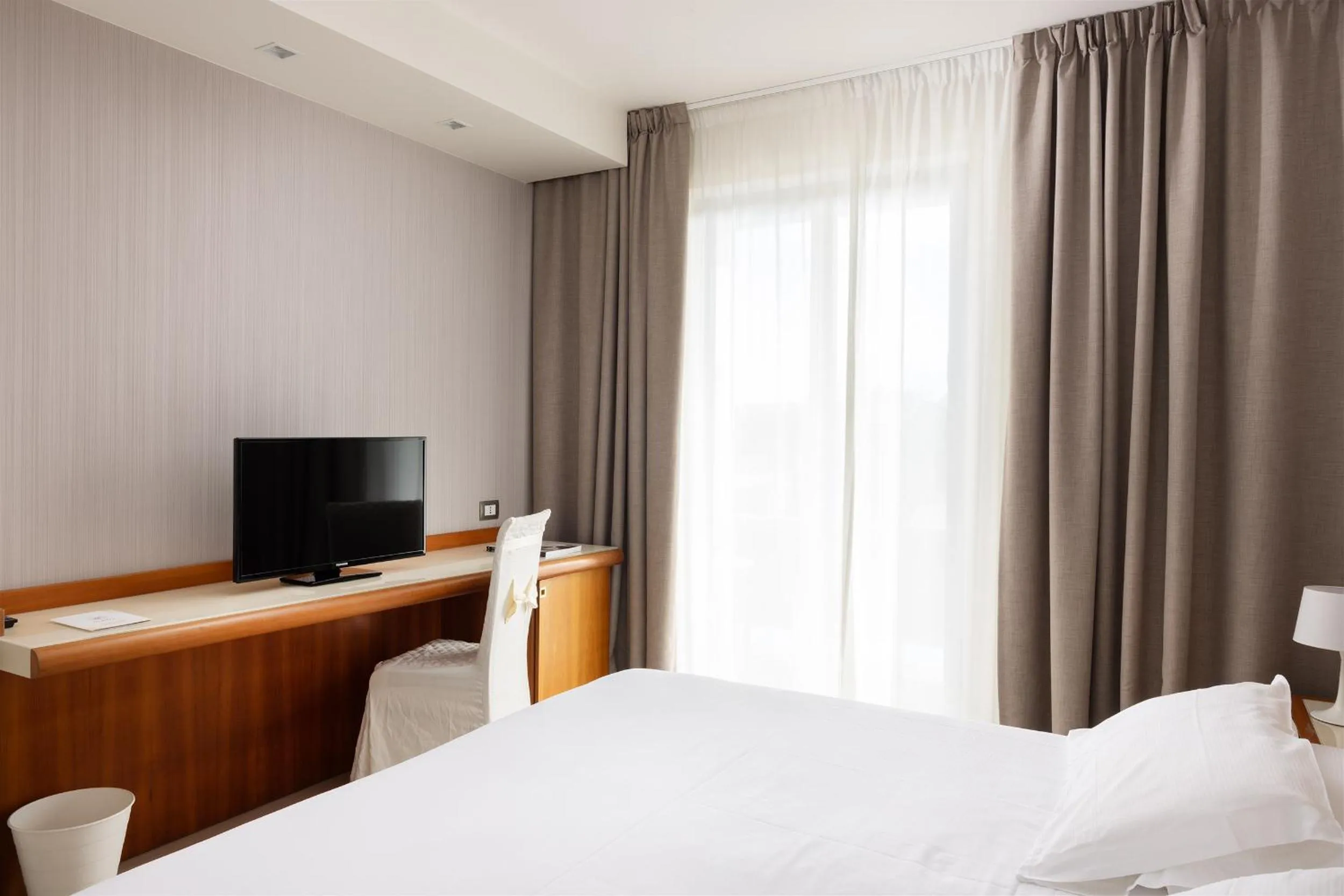 Bed in D'Aragona Lifestyle Hotel