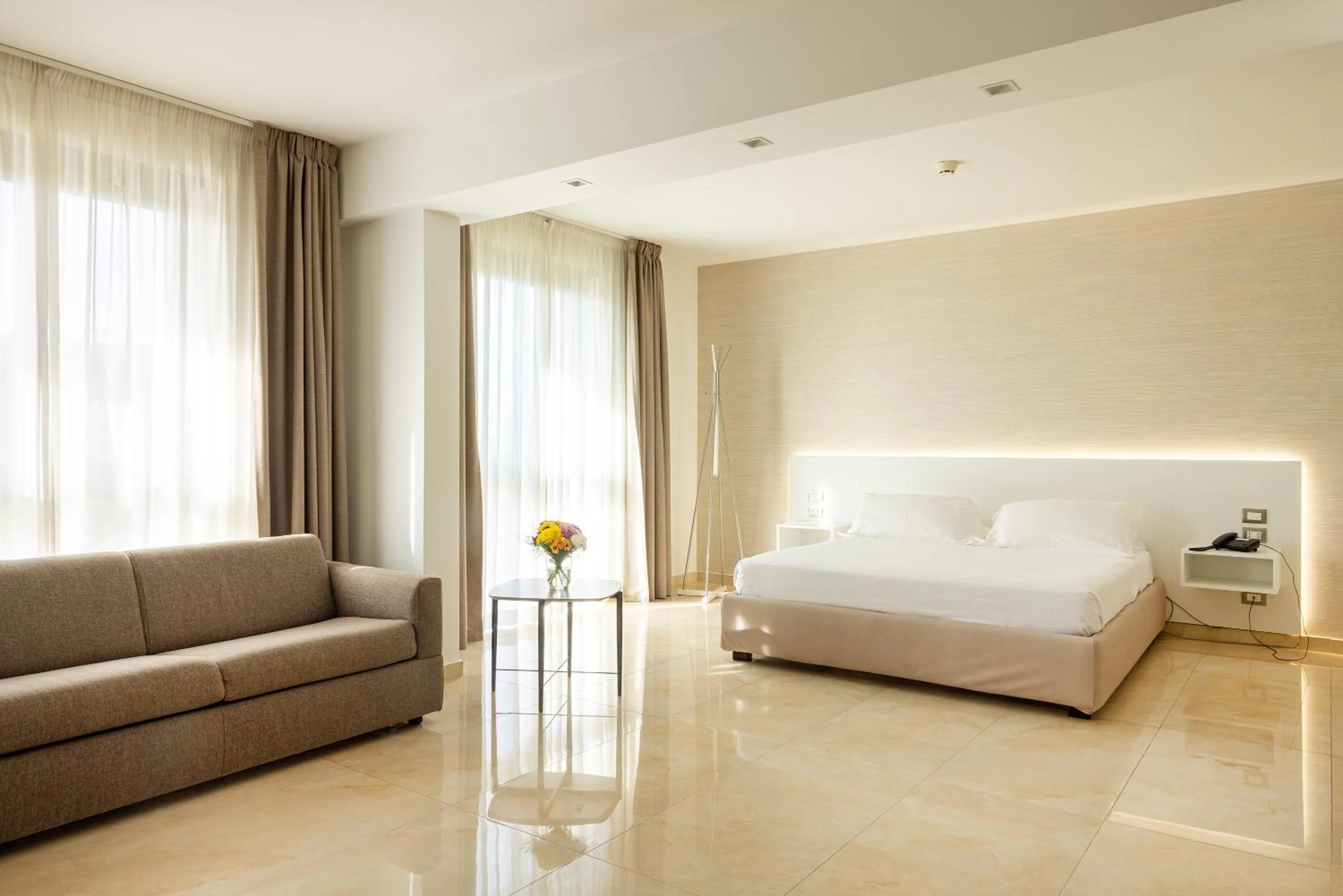 Bed in D'Aragona Lifestyle Hotel