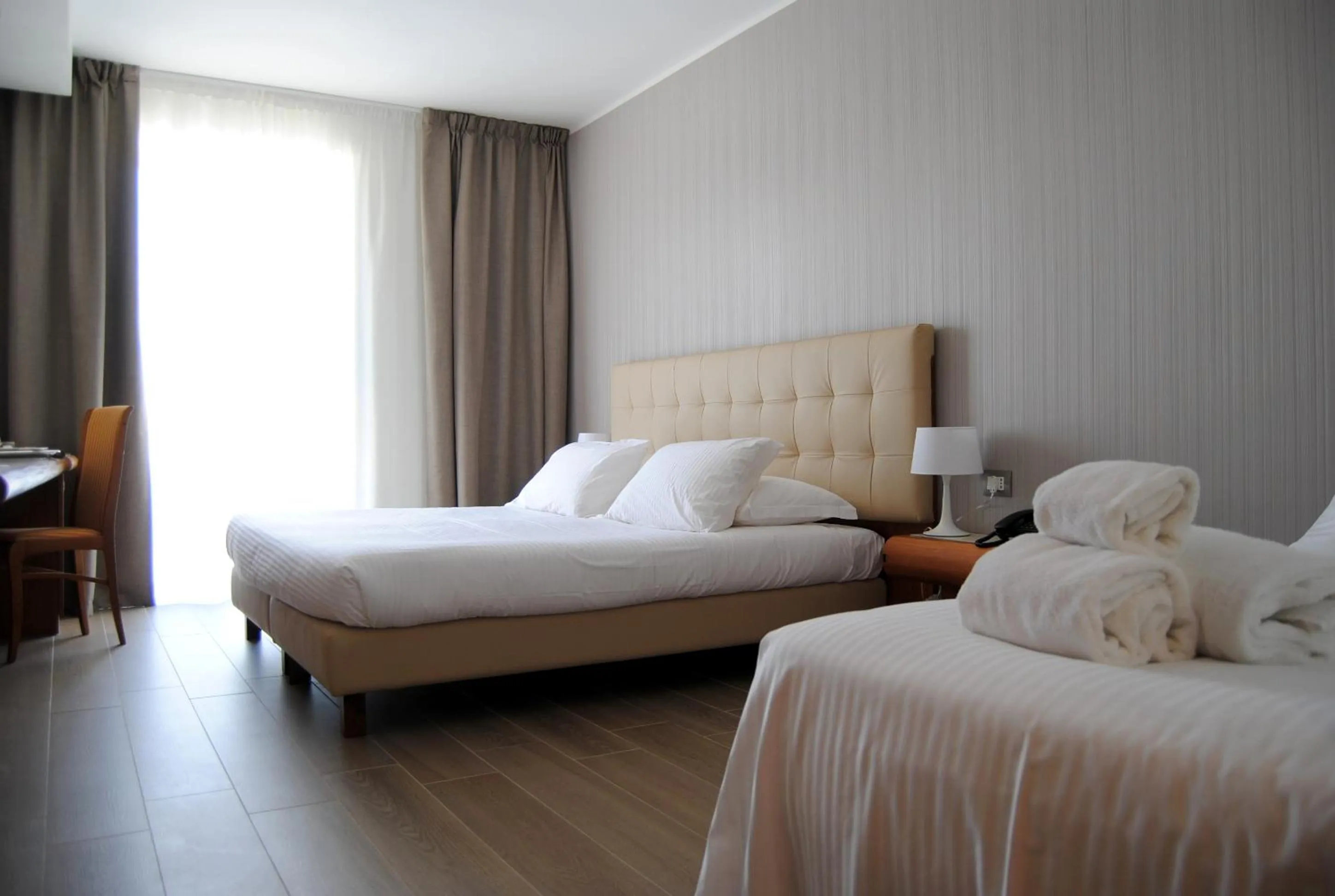 Bed in D'Aragona Lifestyle Hotel