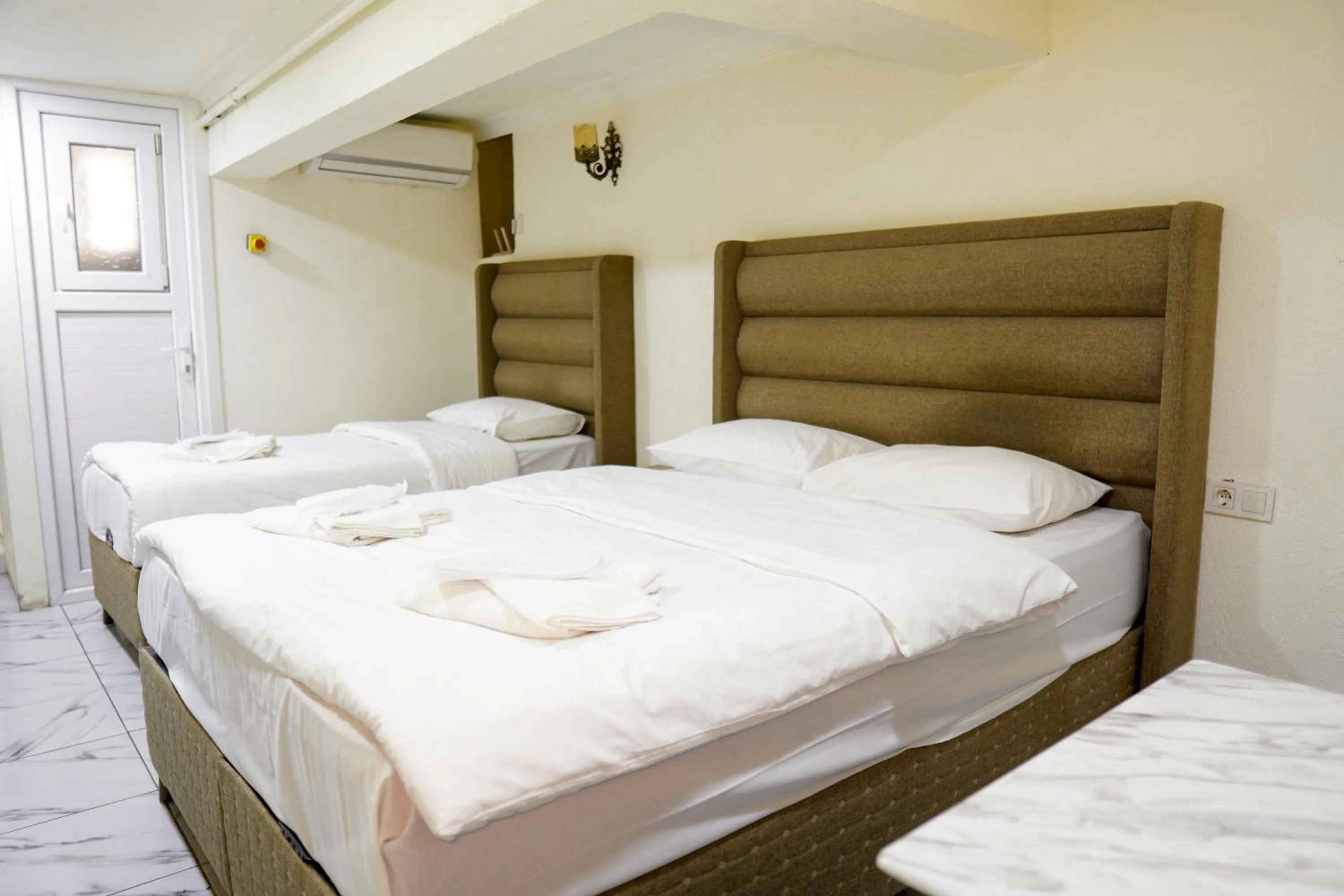 Economy Triple Room in LAOS OTEL