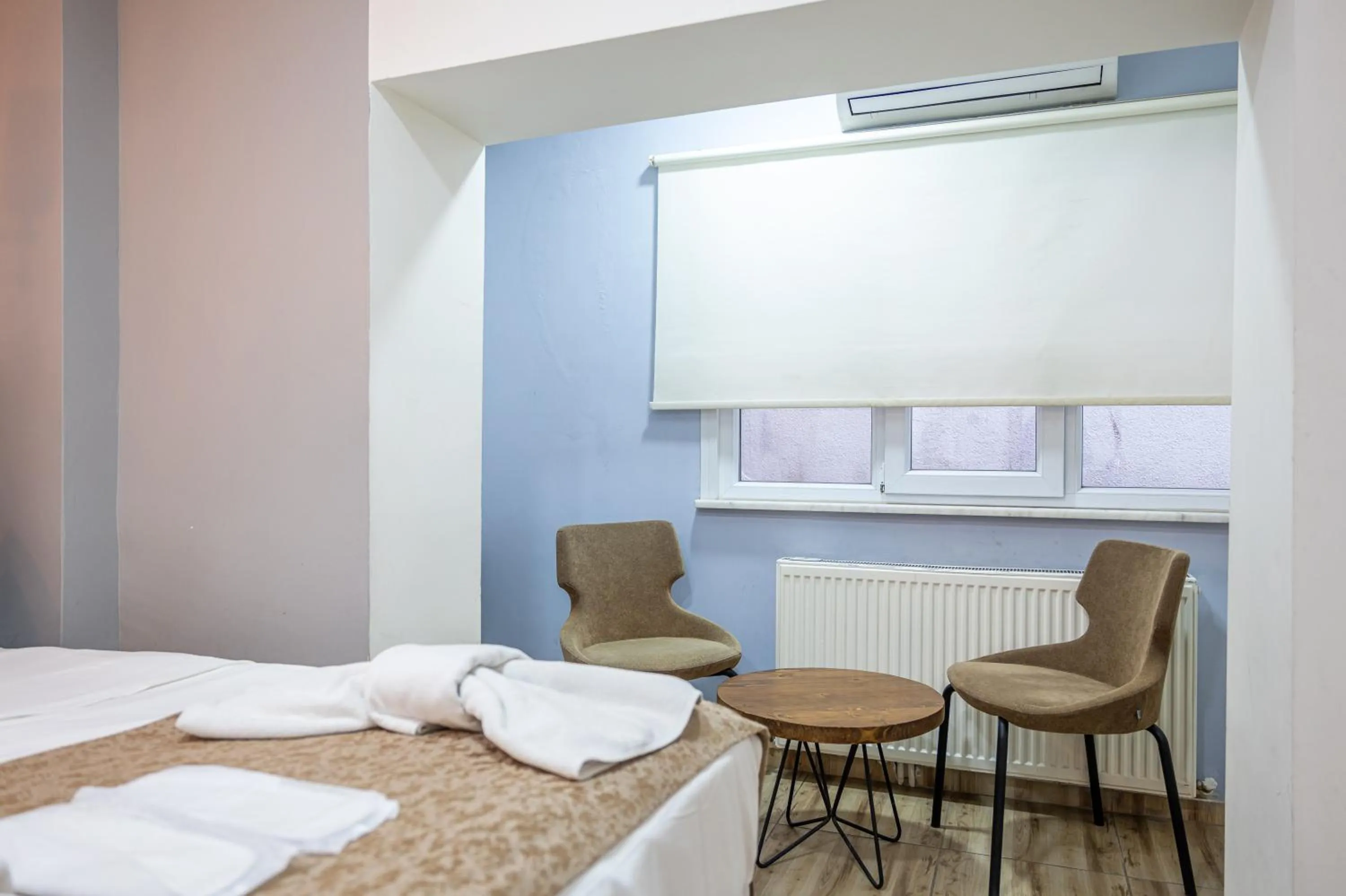 Living room, Bed in LAOS OTEL