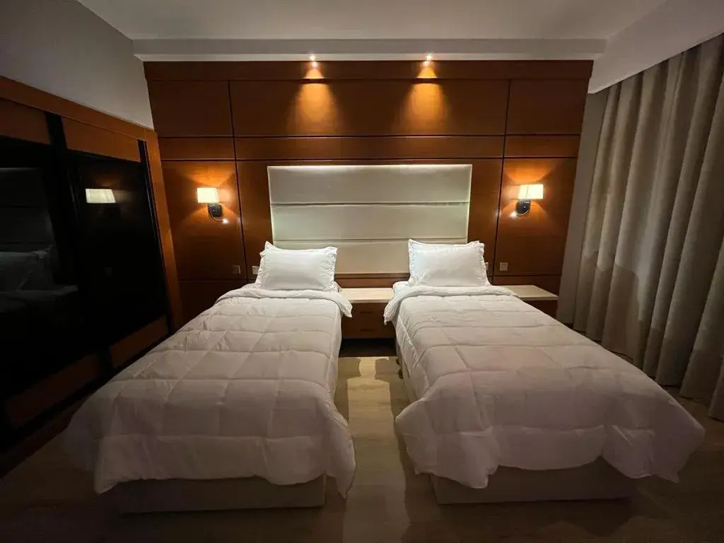 Bed in فندق فلافور Flavor Hotel Bed in فندق فلافور Flavor Hotel