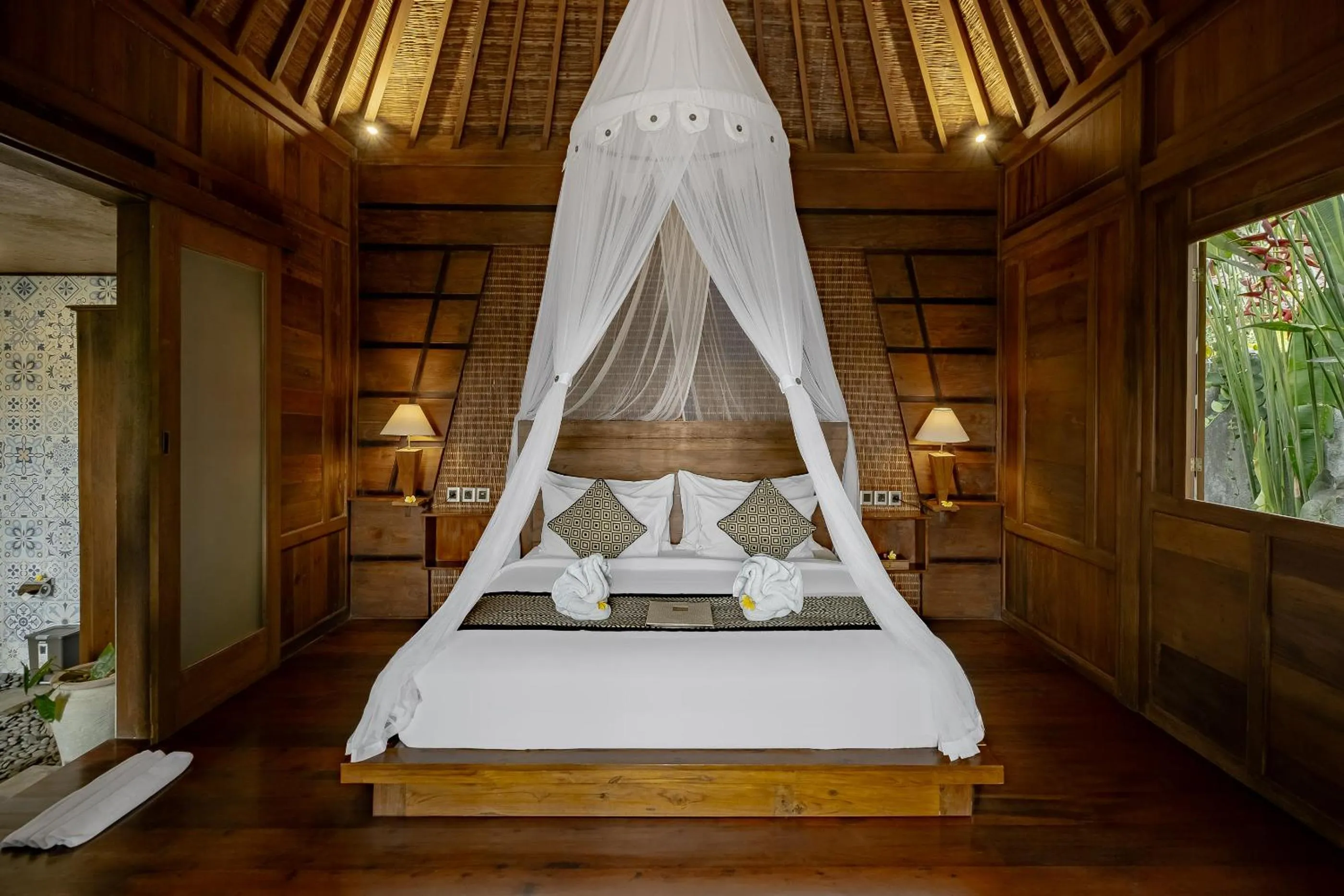 Bed in Anandari Ubud Villa