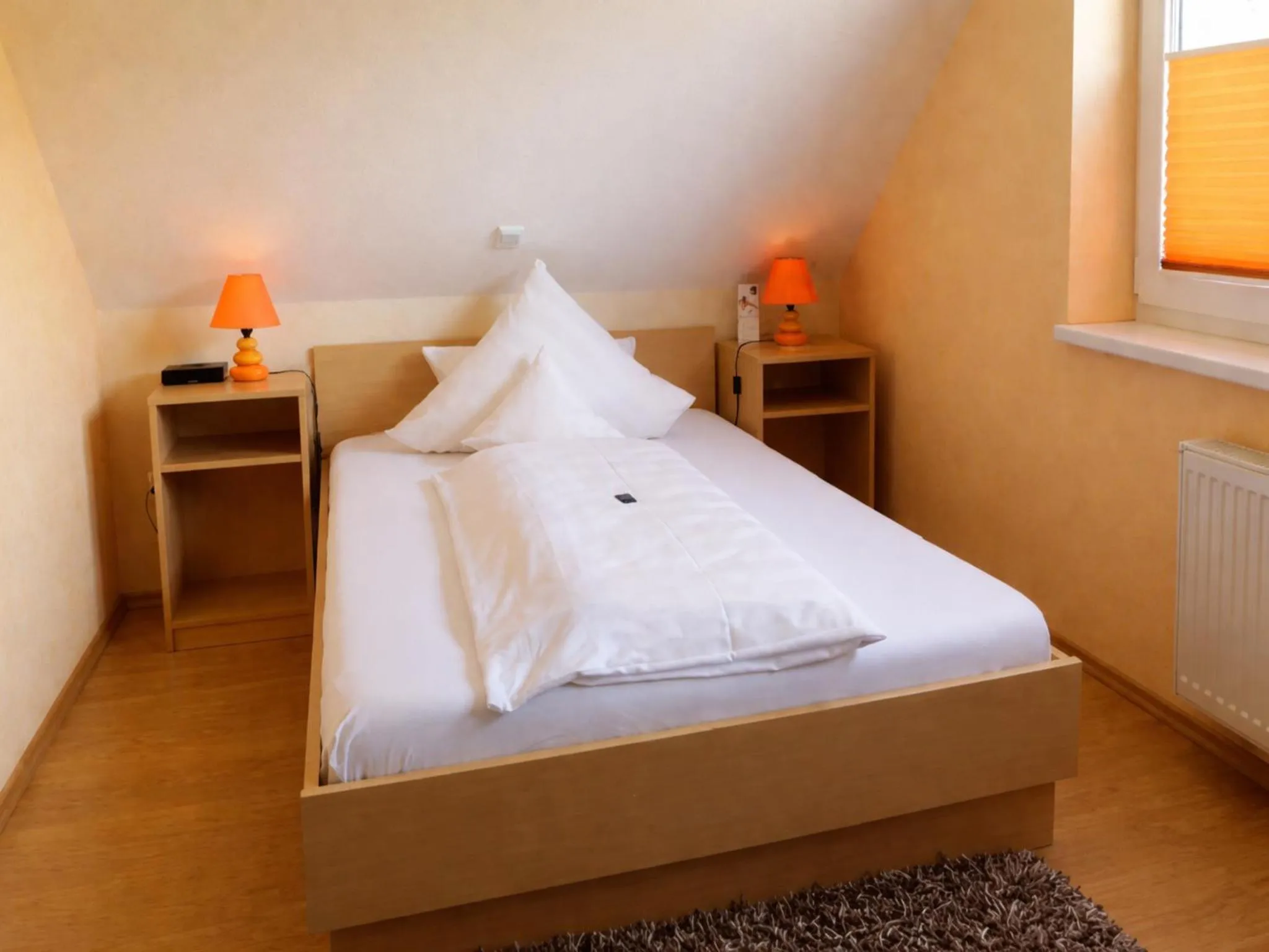 Bedroom, Bed in Bernsteinsee Hotel and Ferien by Palette Resorts