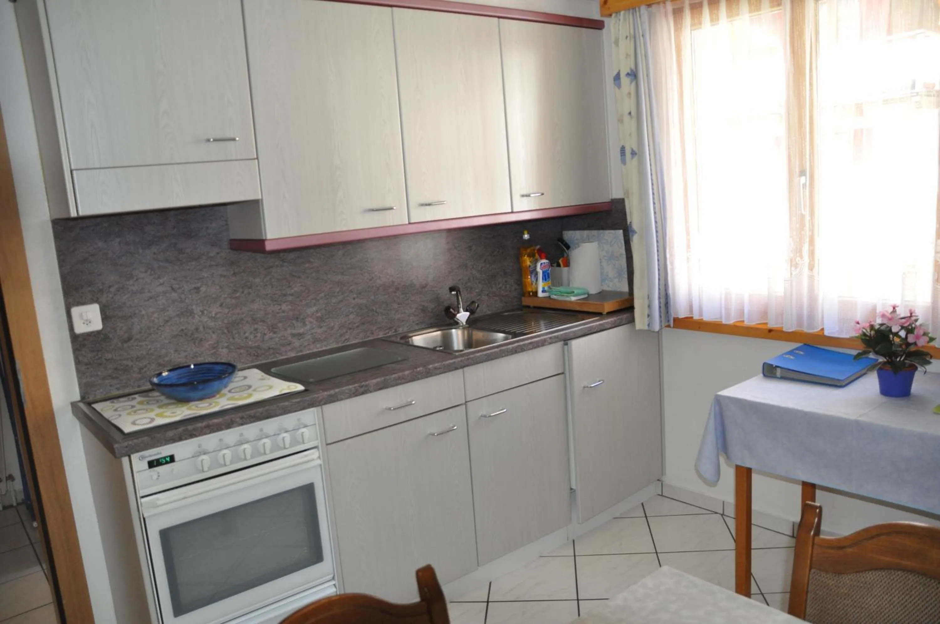 Kitchen or kitchenette in Apartmenthaus Holiday