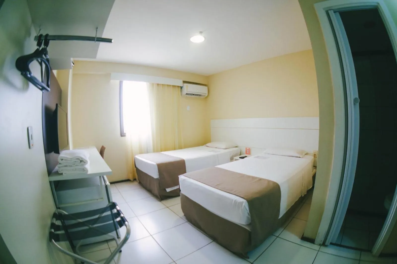 Bed in Soft Win Hotel São Luís