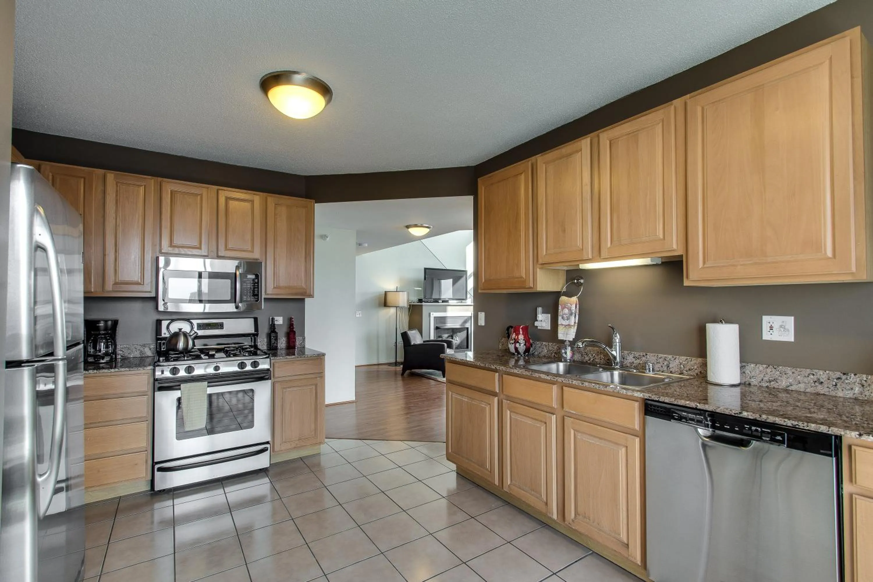 Kitchen or kitchenette in The Penthouse at Grand Plaza