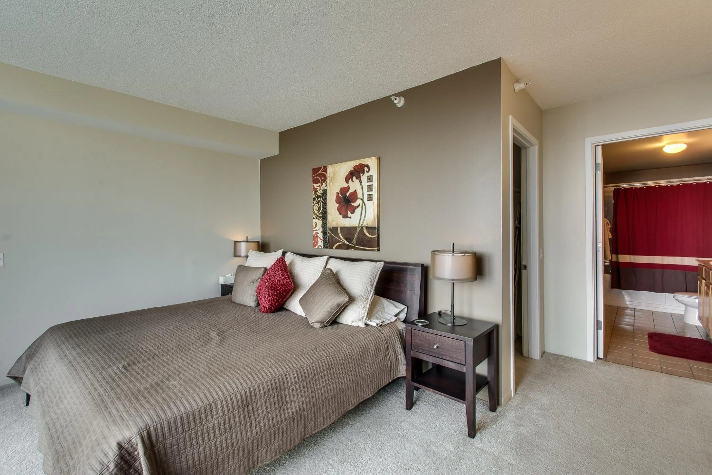 Bed in The Penthouse at Grand Plaza