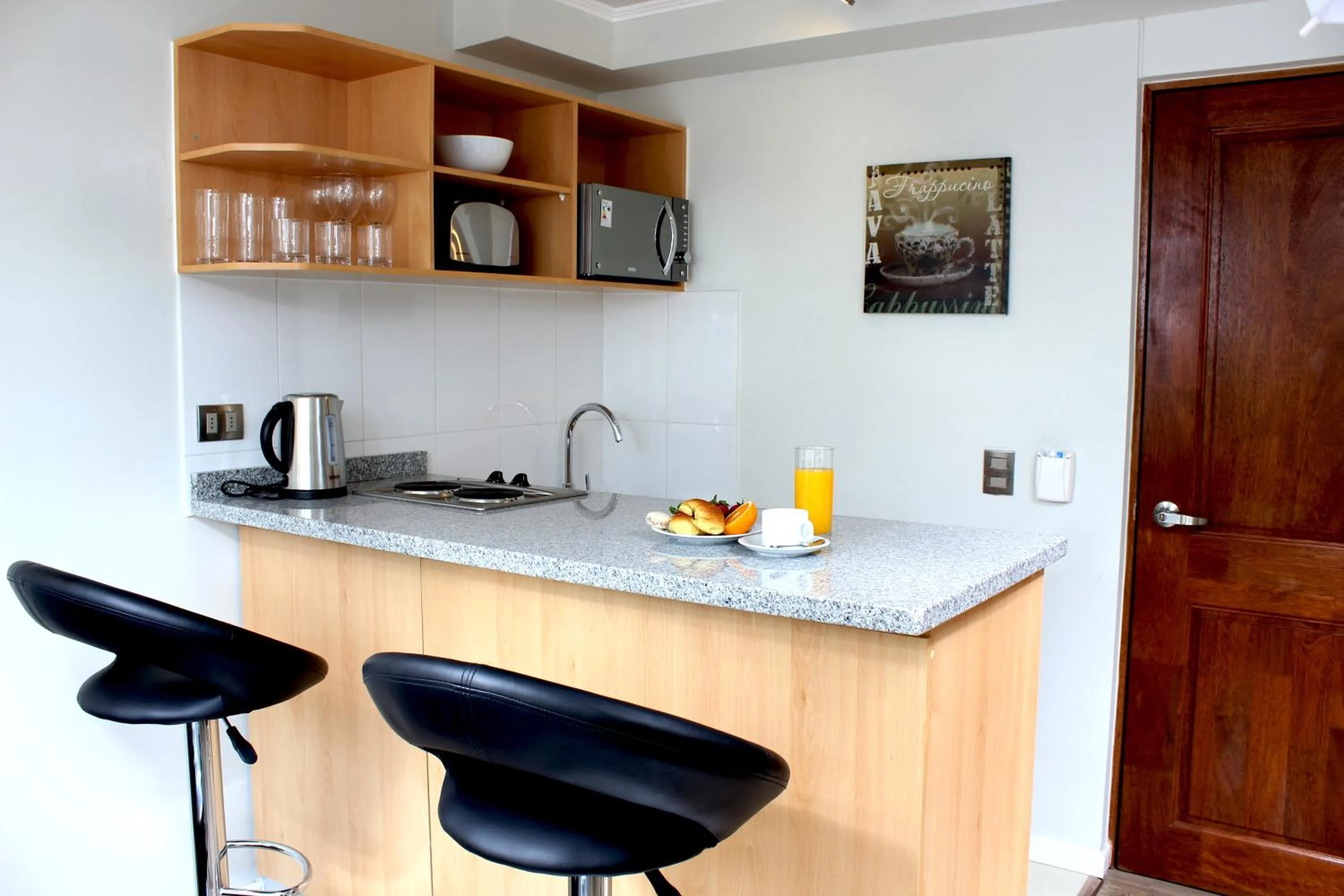Kitchen or kitchenette in Apart Hotel Providencia