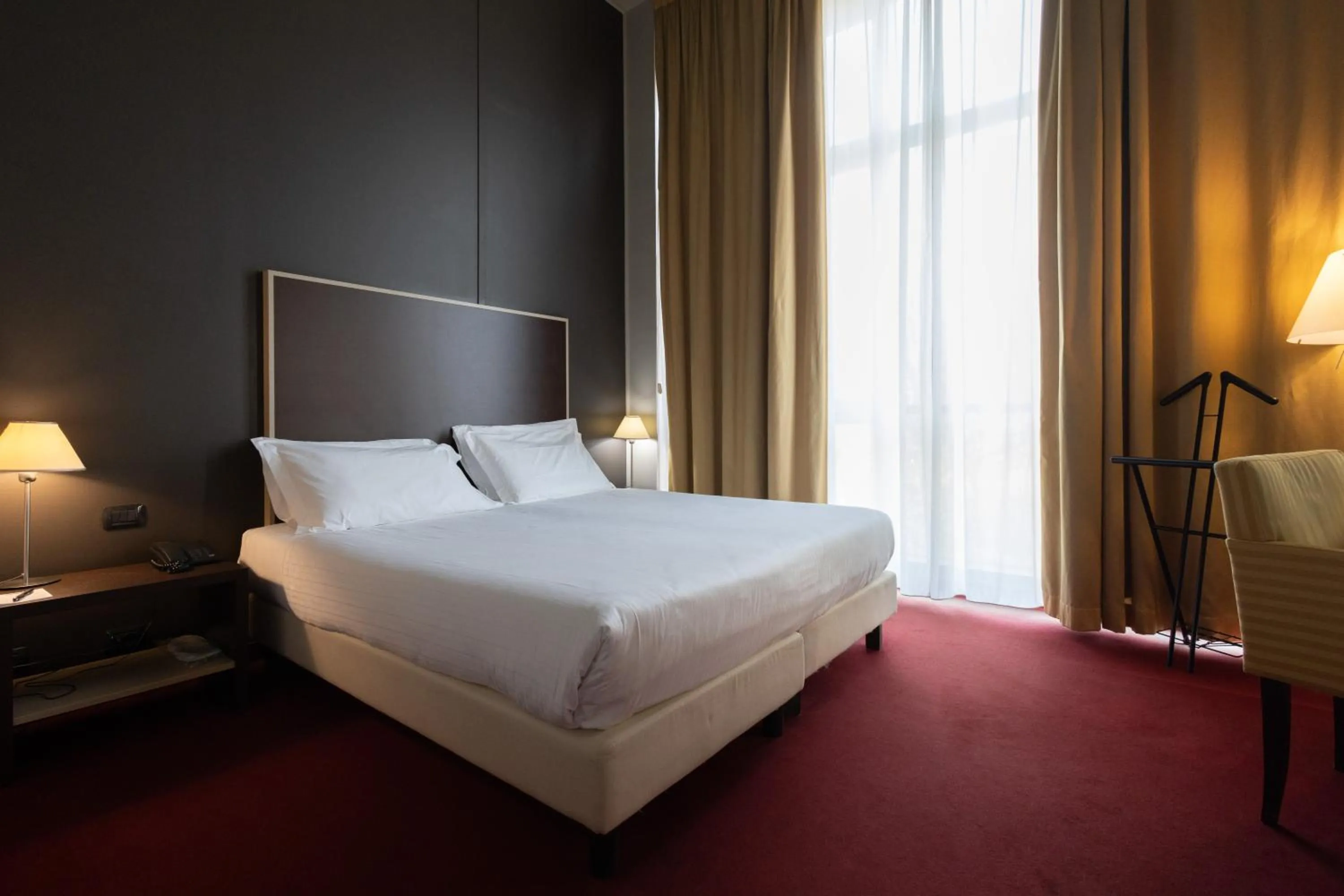 Bed in Art Hotel Olympic