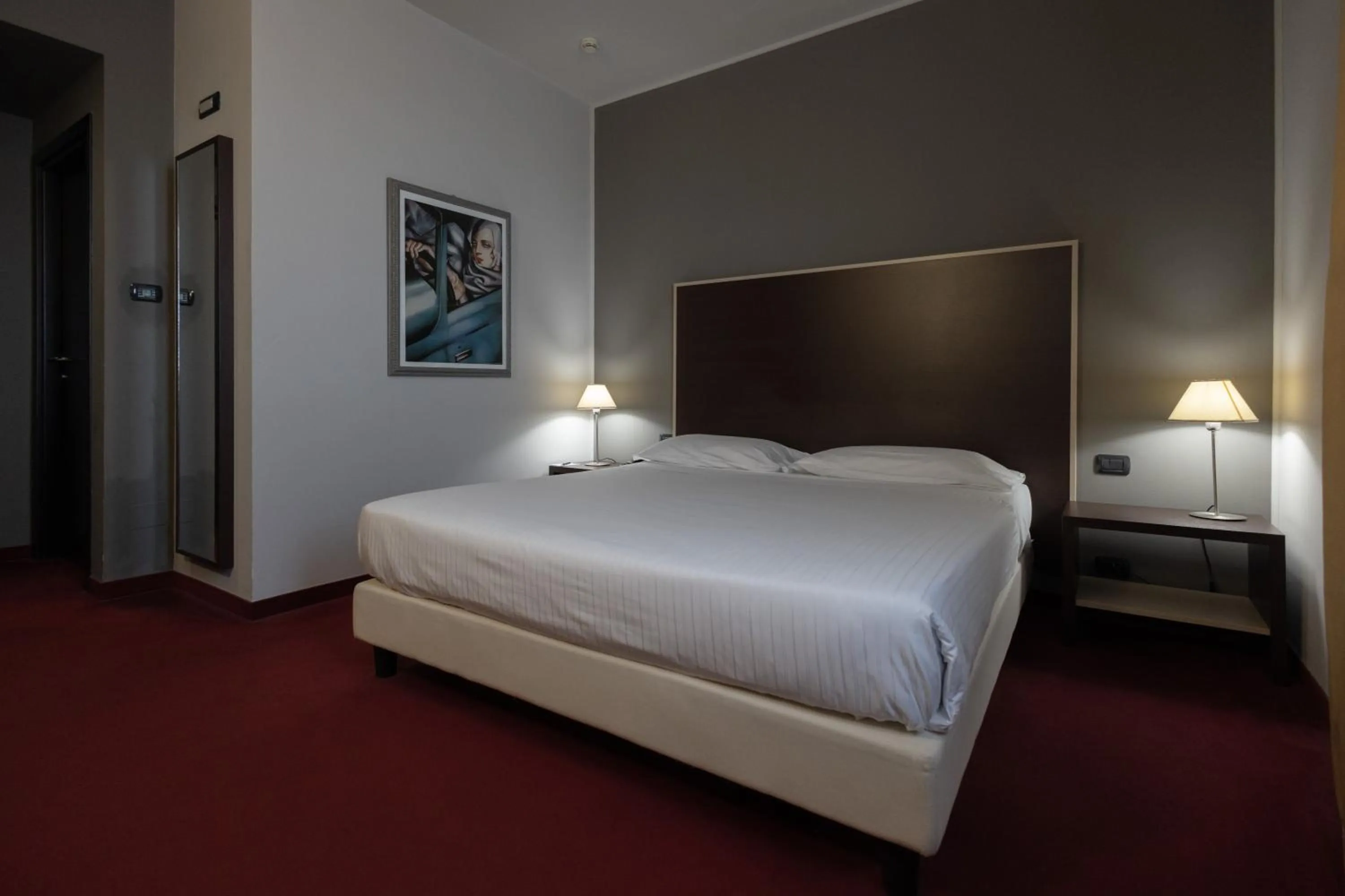 Bed in Art Hotel Olympic