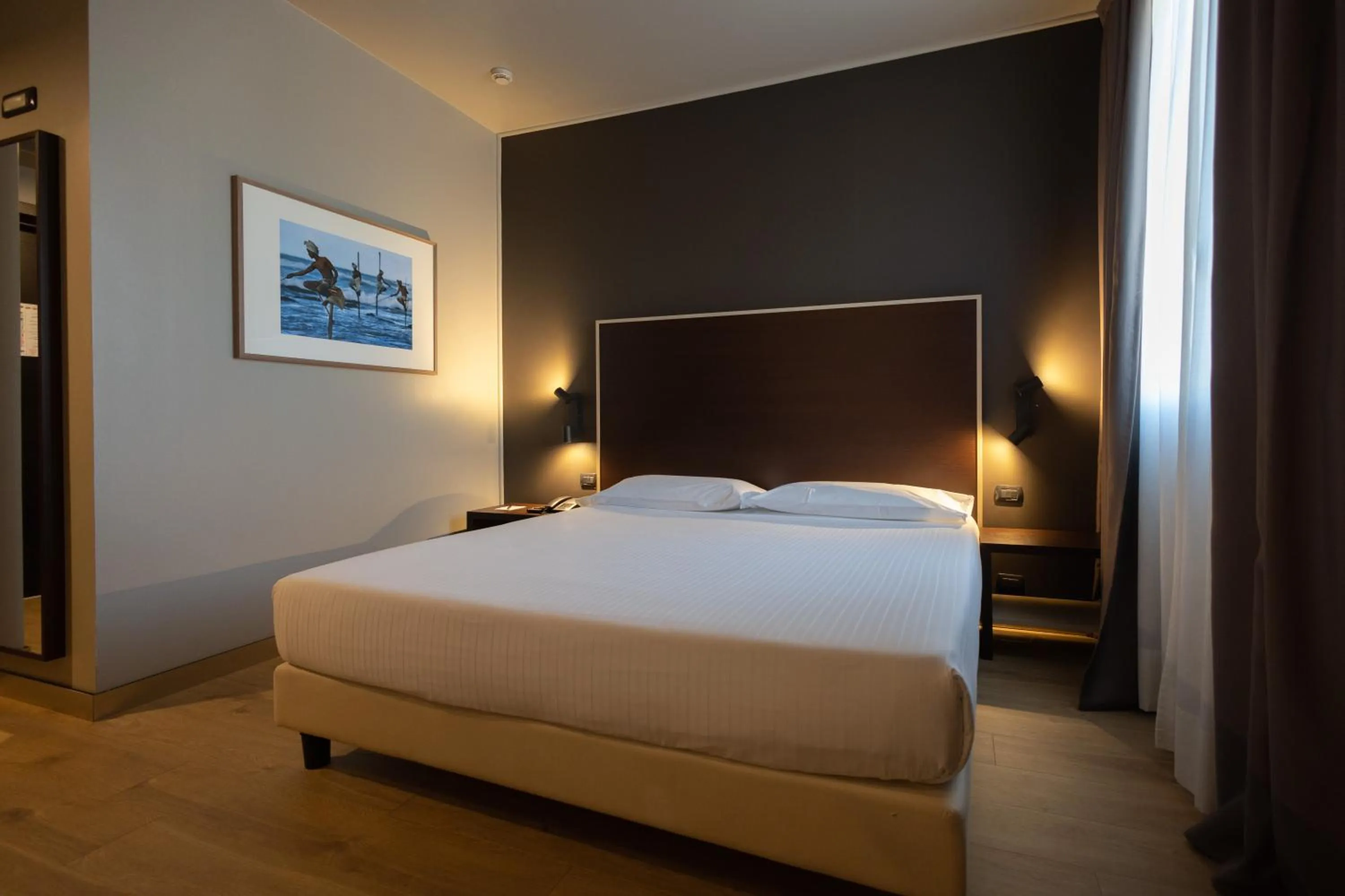 Bed in Art Hotel Olympic