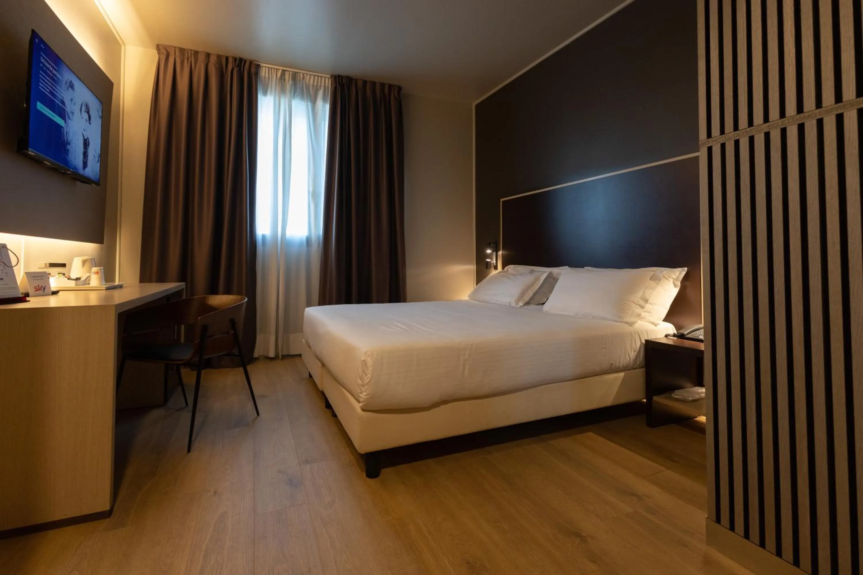 Bed in Art Hotel Olympic