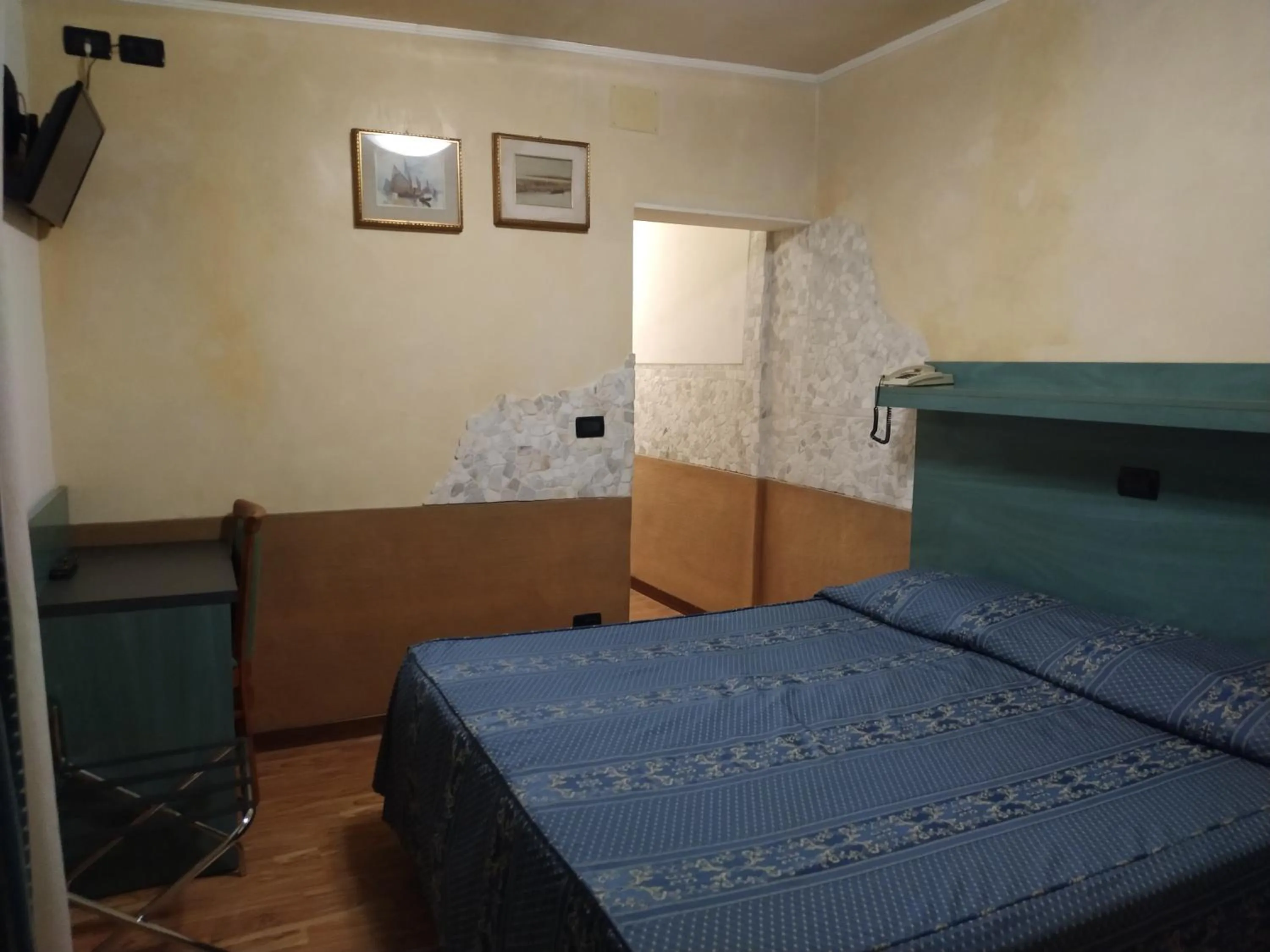 Bed in Atlantide Hotel