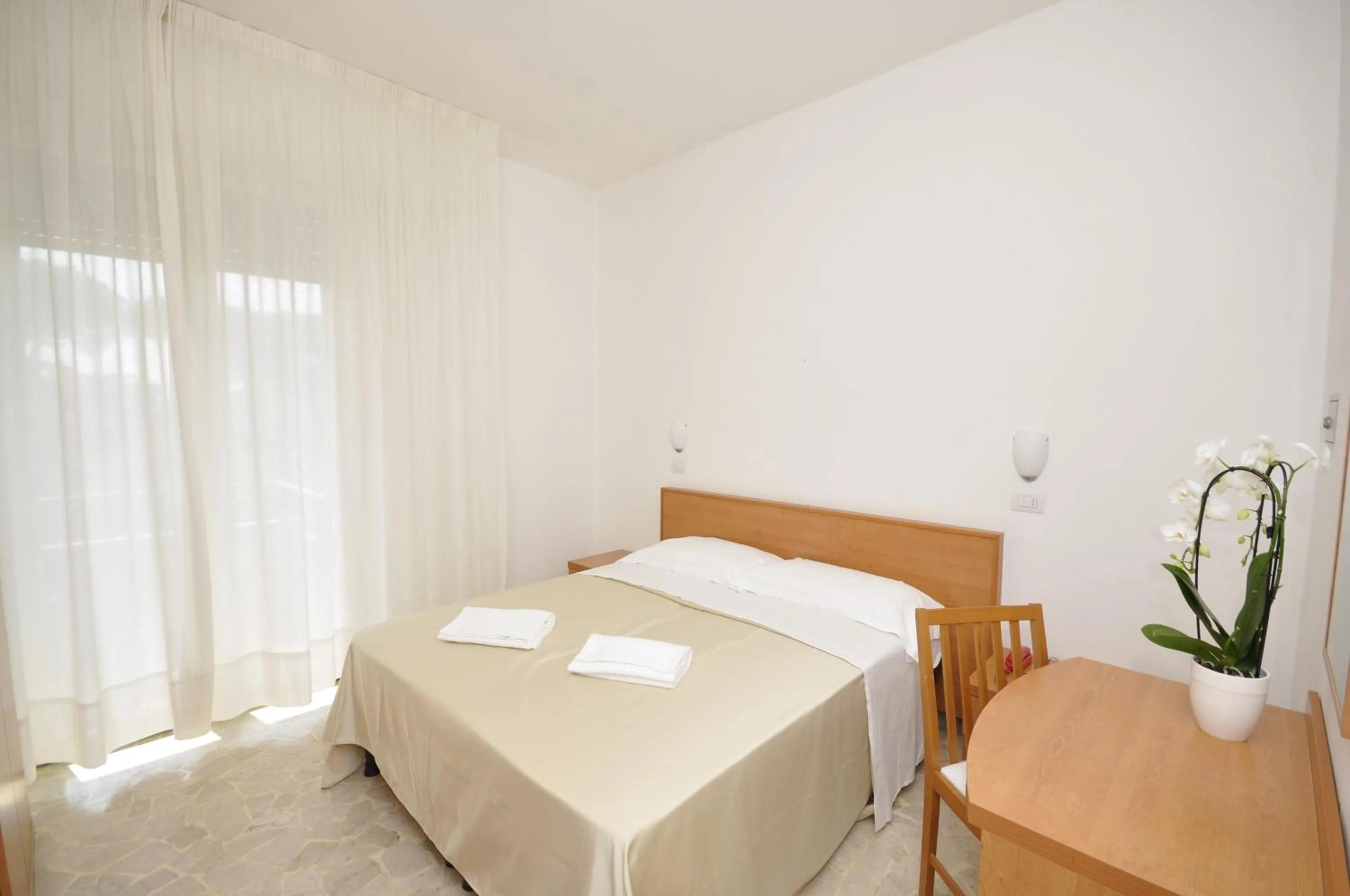 Bed in Hotel Airone