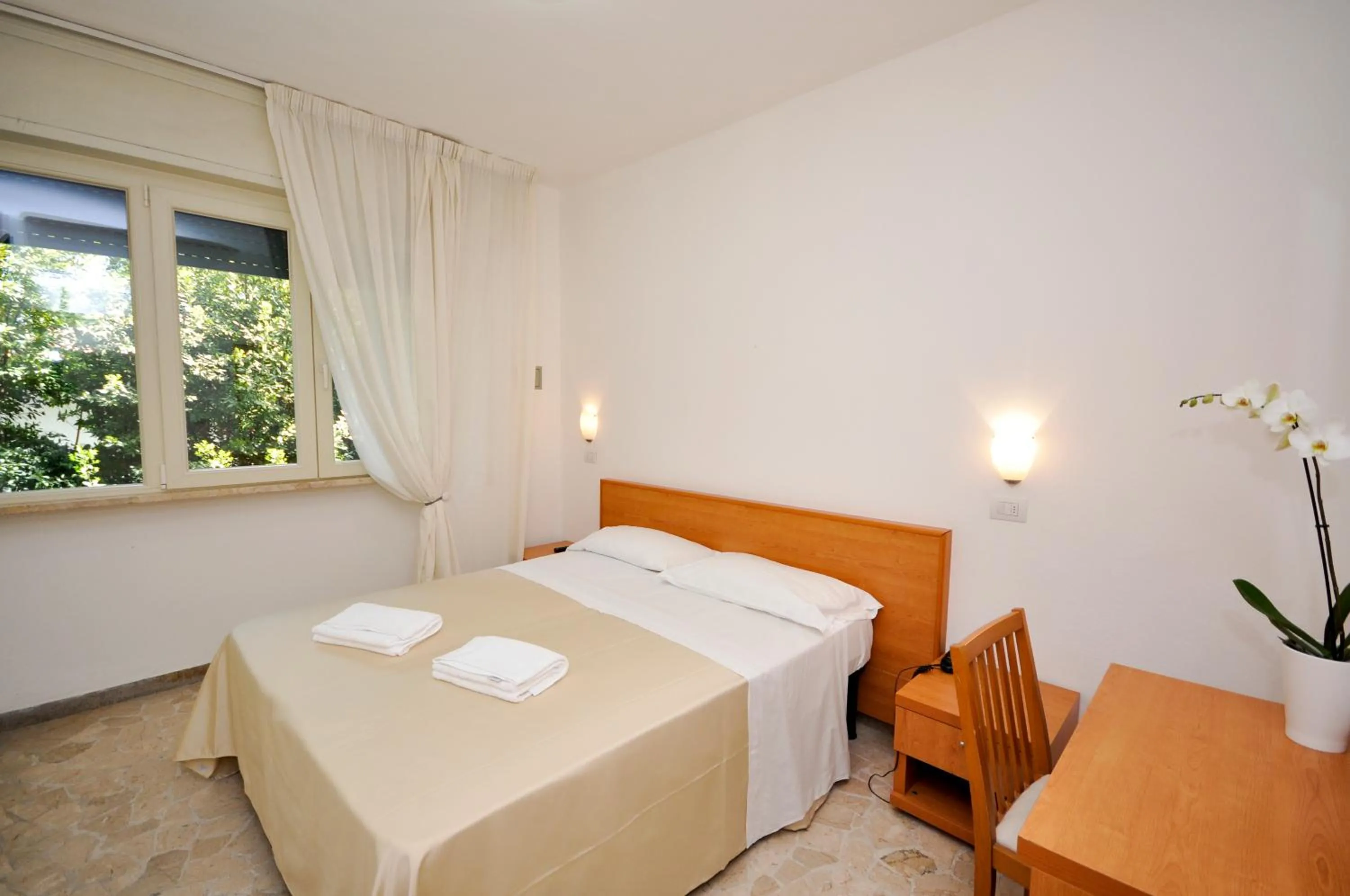 Bed in Hotel Airone