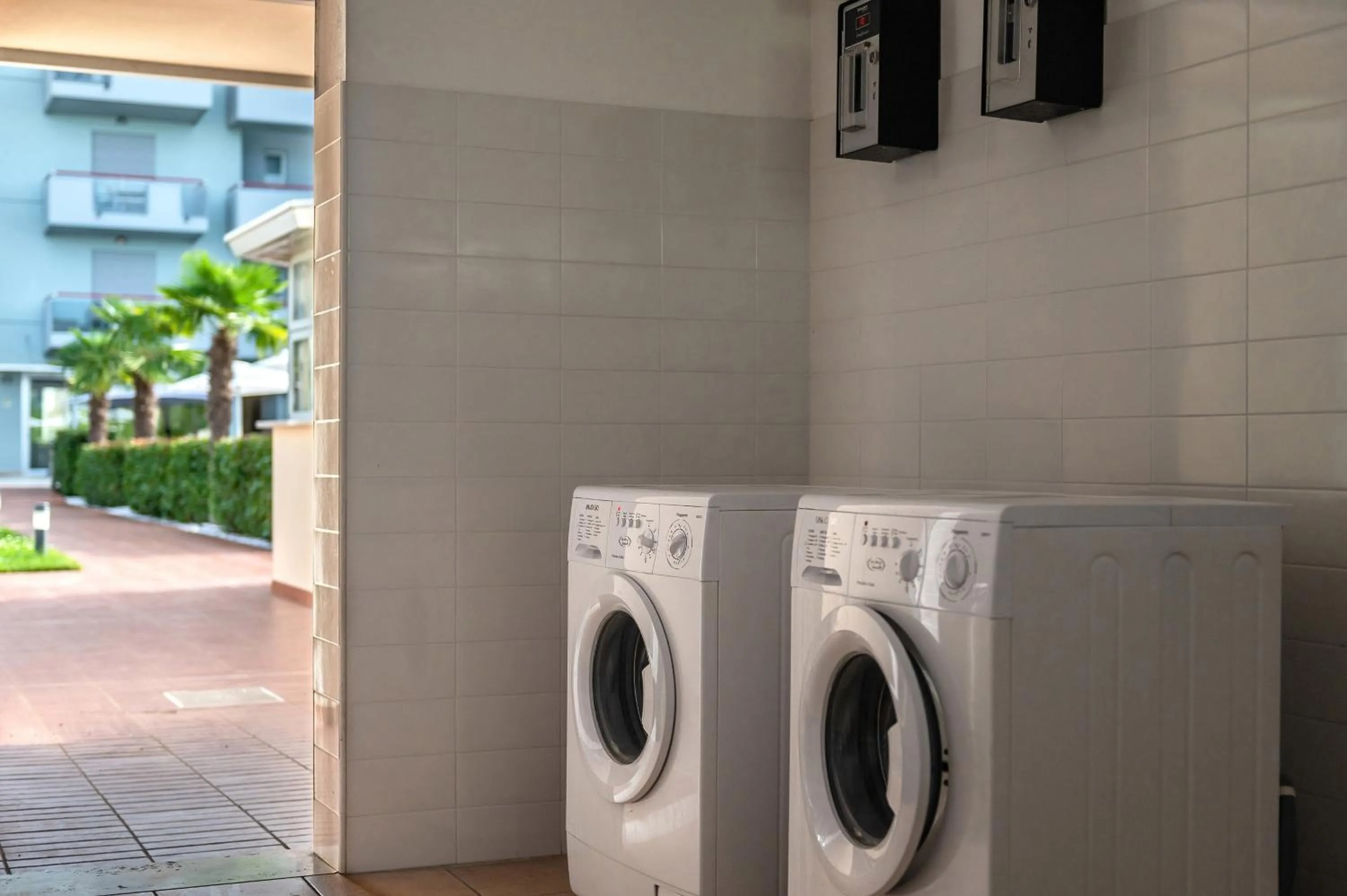 laundry in Domino Suite Hotel & Residence