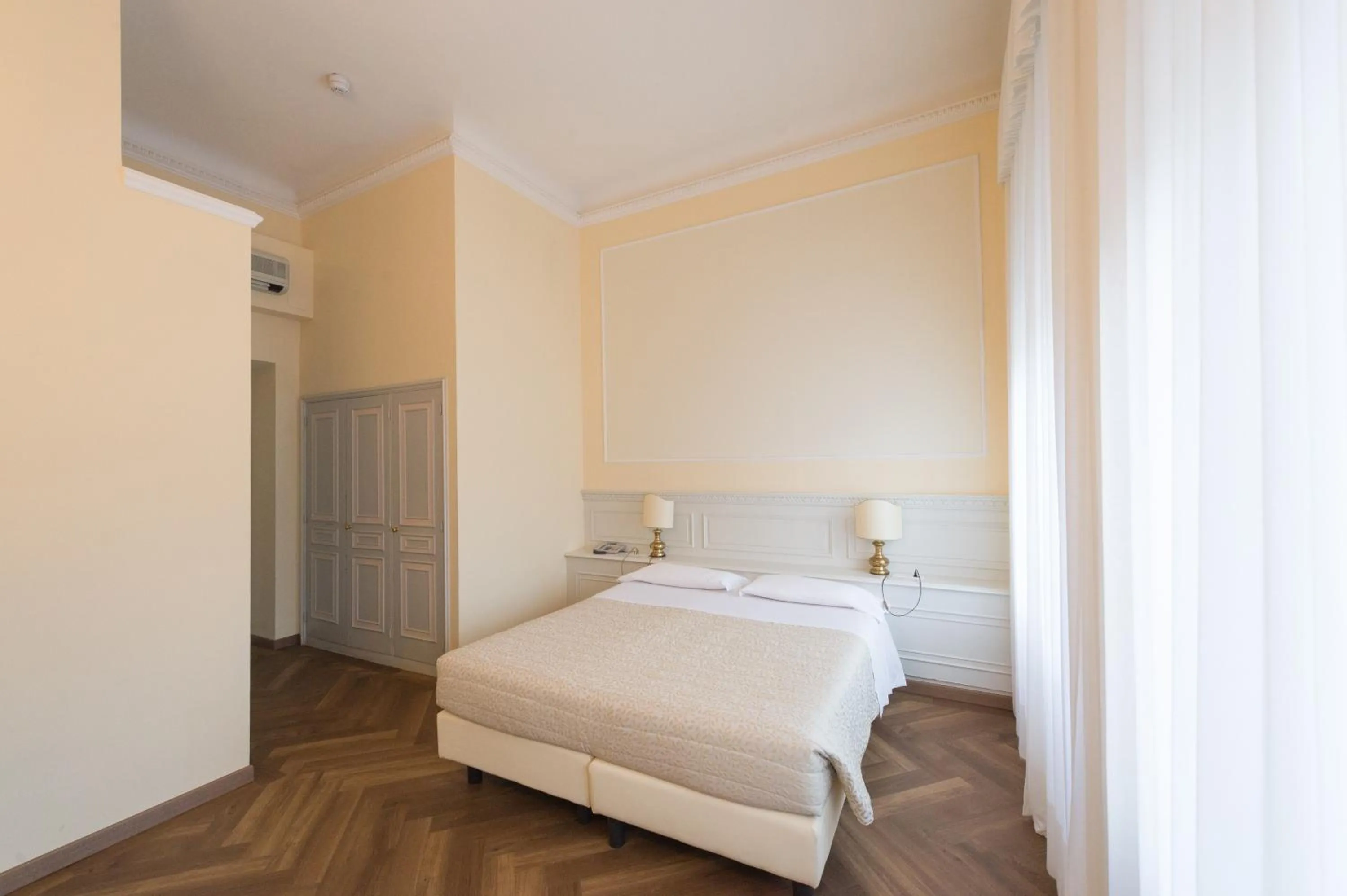 Bed in Grand Hotel Liberty