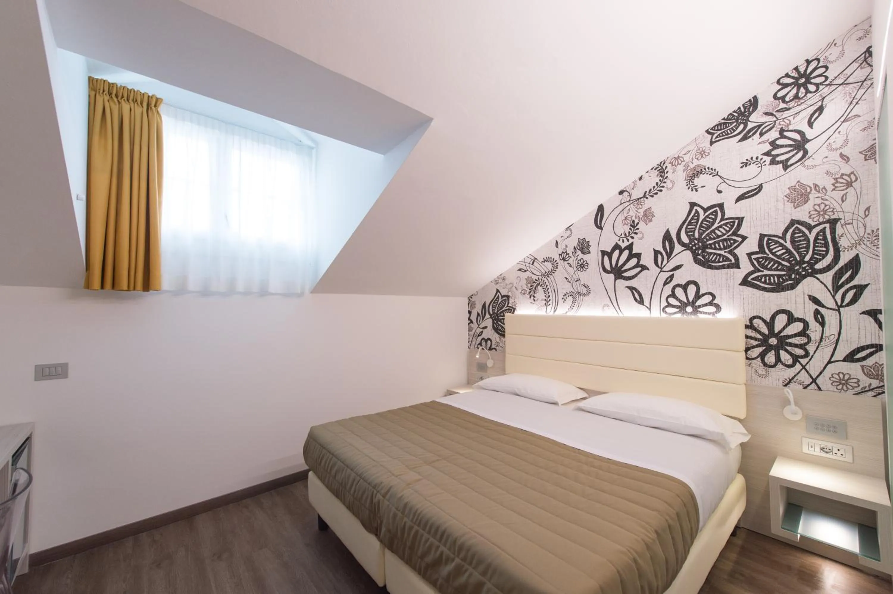 Bed in Grand Hotel Liberty