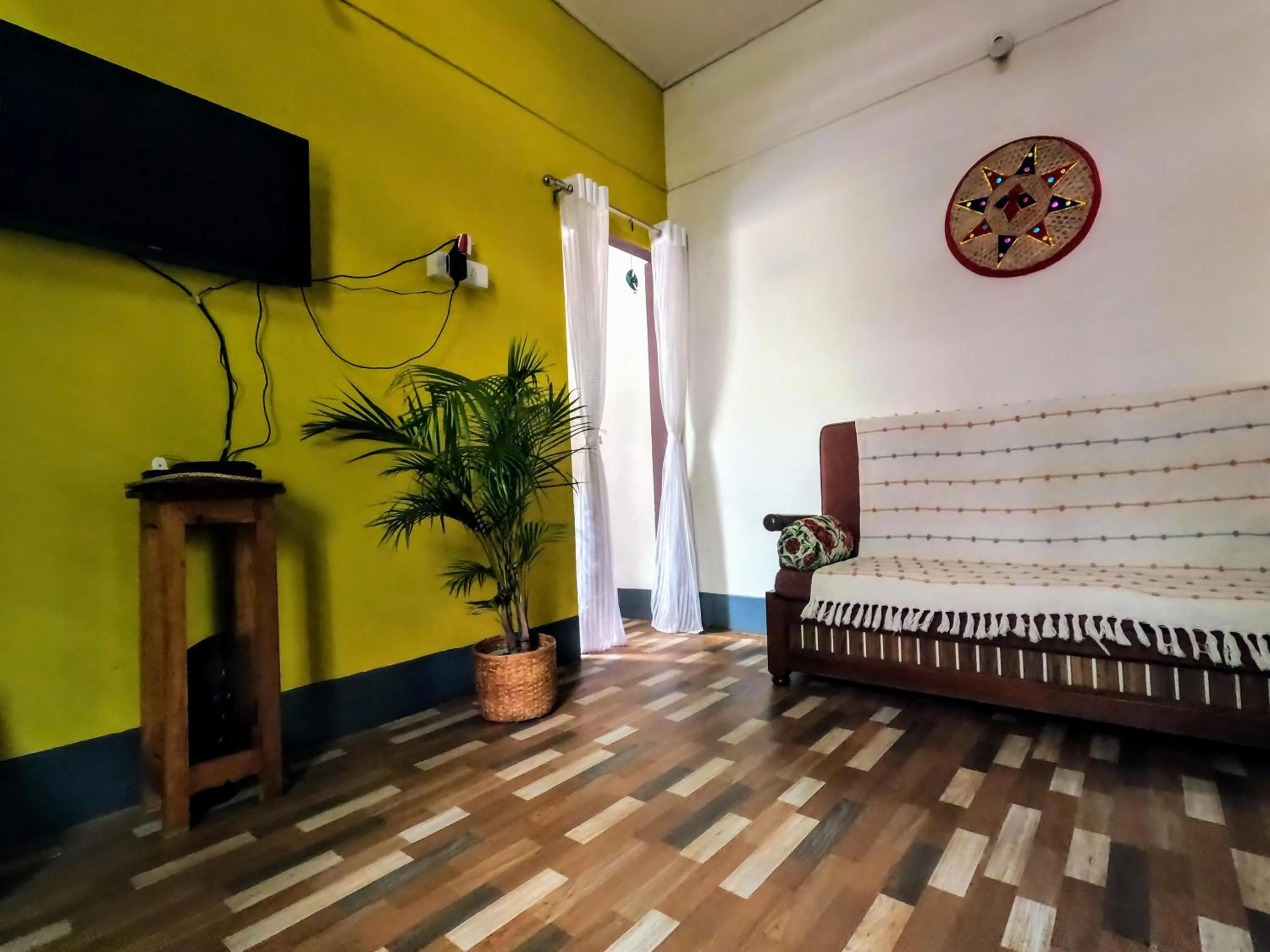 Communal lounge/ TV room, Bed in Stargaze Backpackers Hostel