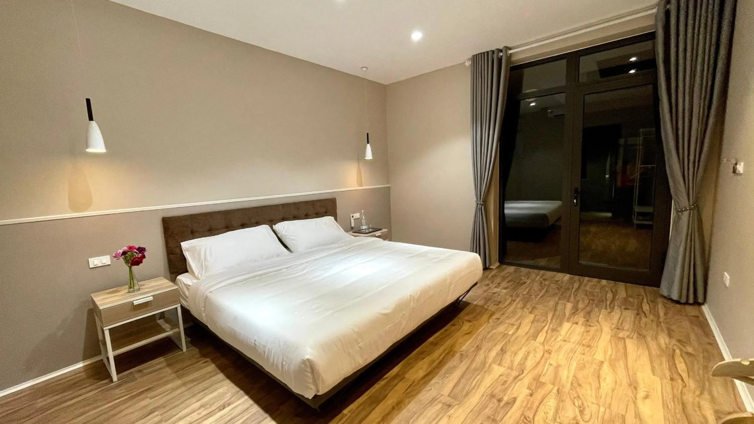 Bed in PHOENIX MINH CHÂU HOTEL