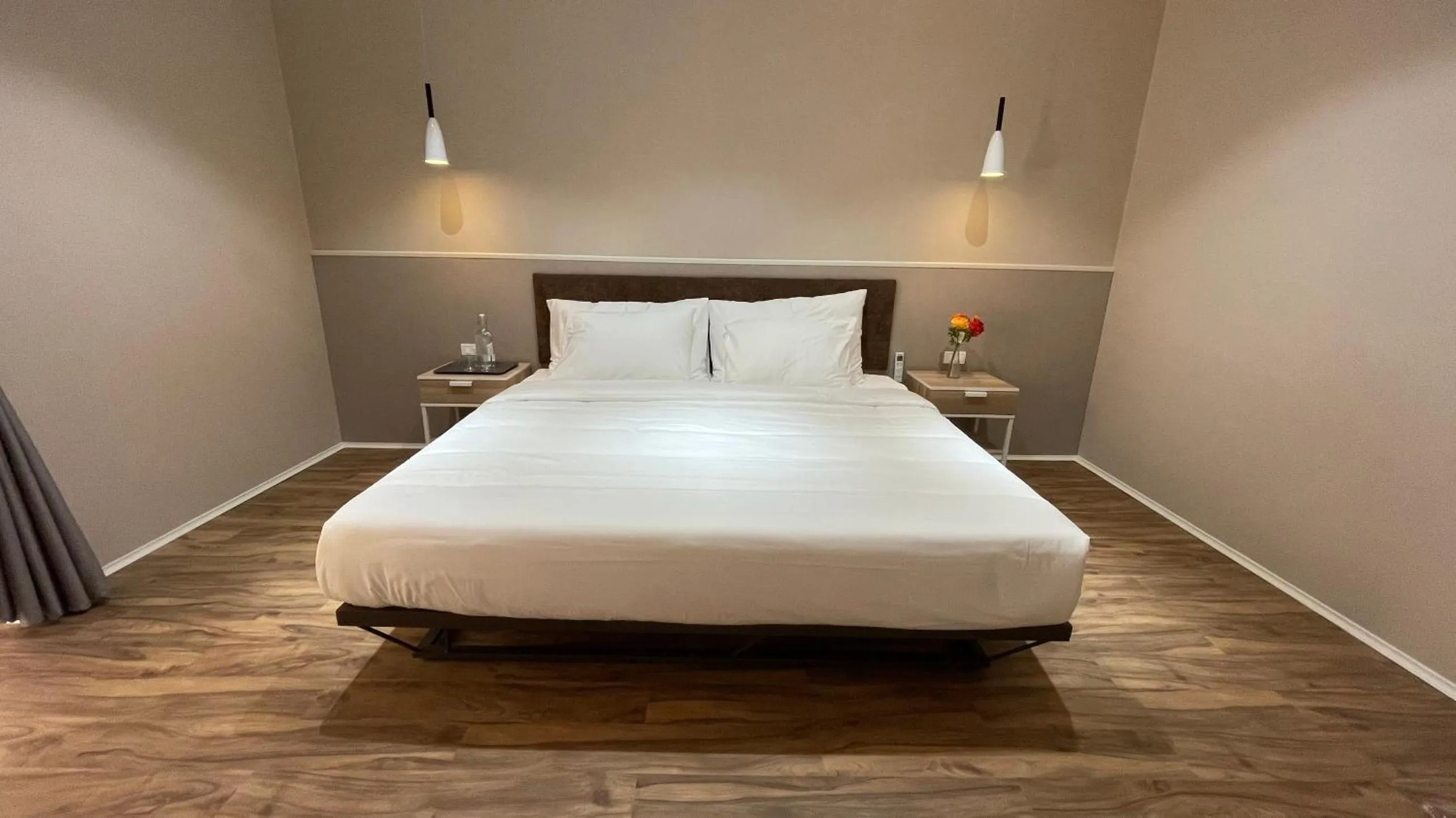 Bed in PHOENIX MINH CHÂU HOTEL