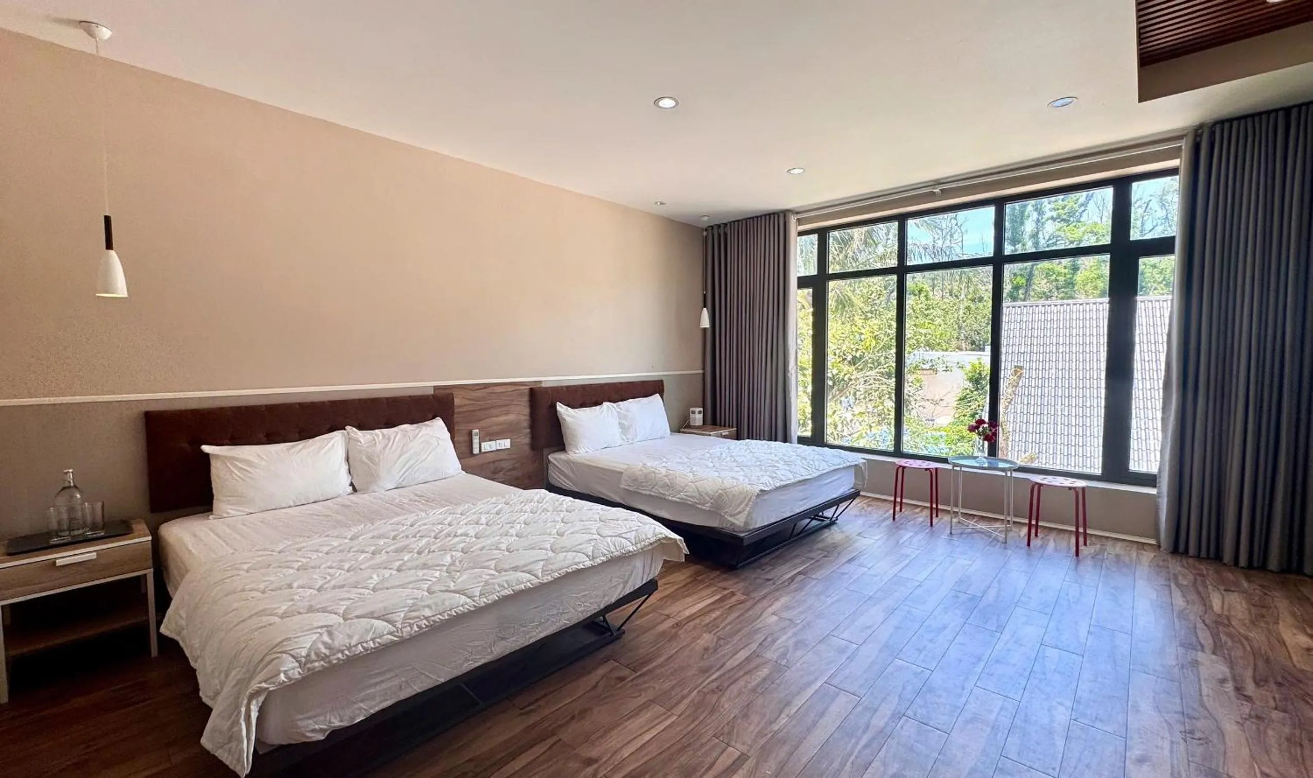 Bed in PHOENIX MINH CHÂU HOTEL