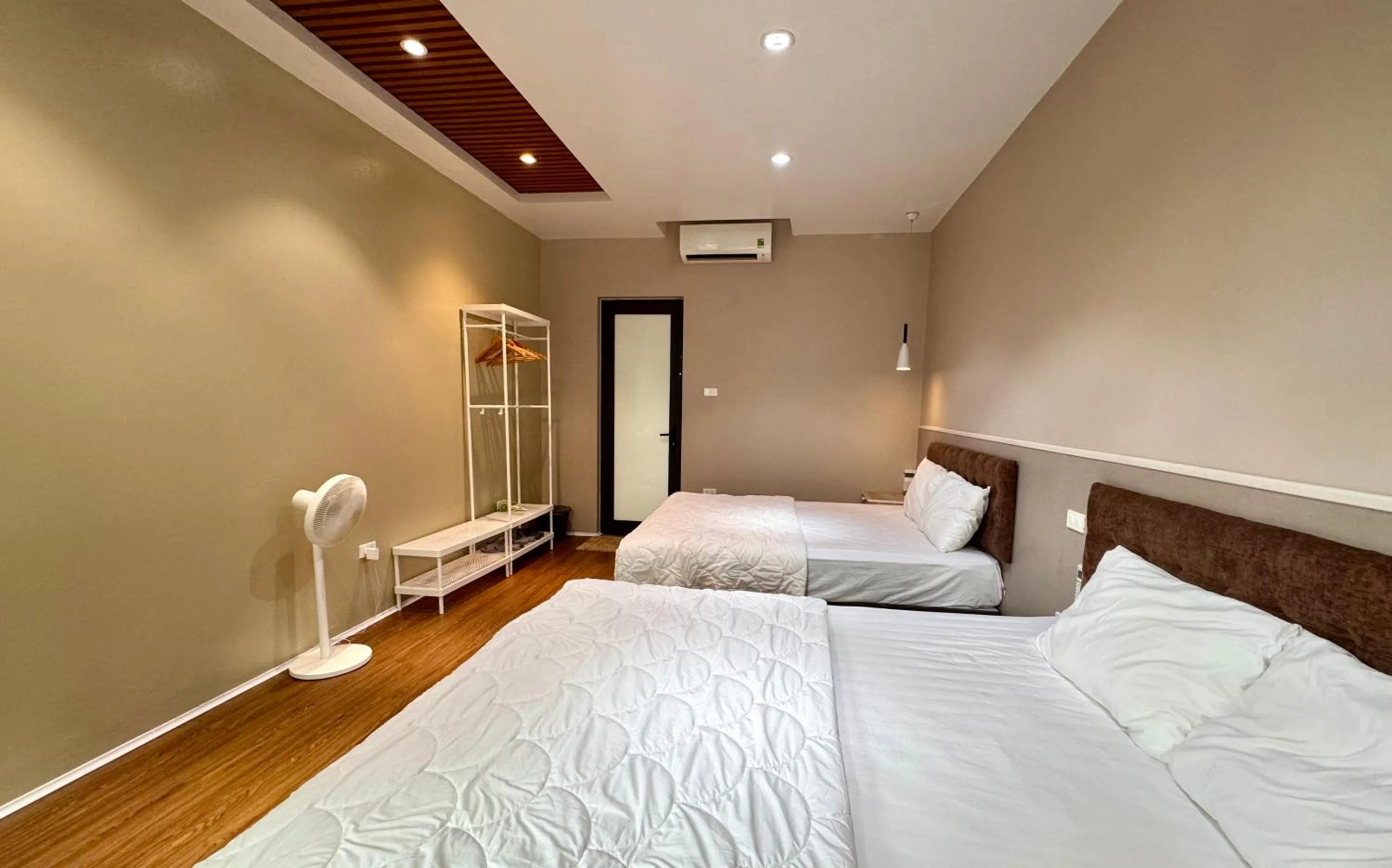 Bed in PHOENIX MINH CHÂU HOTEL