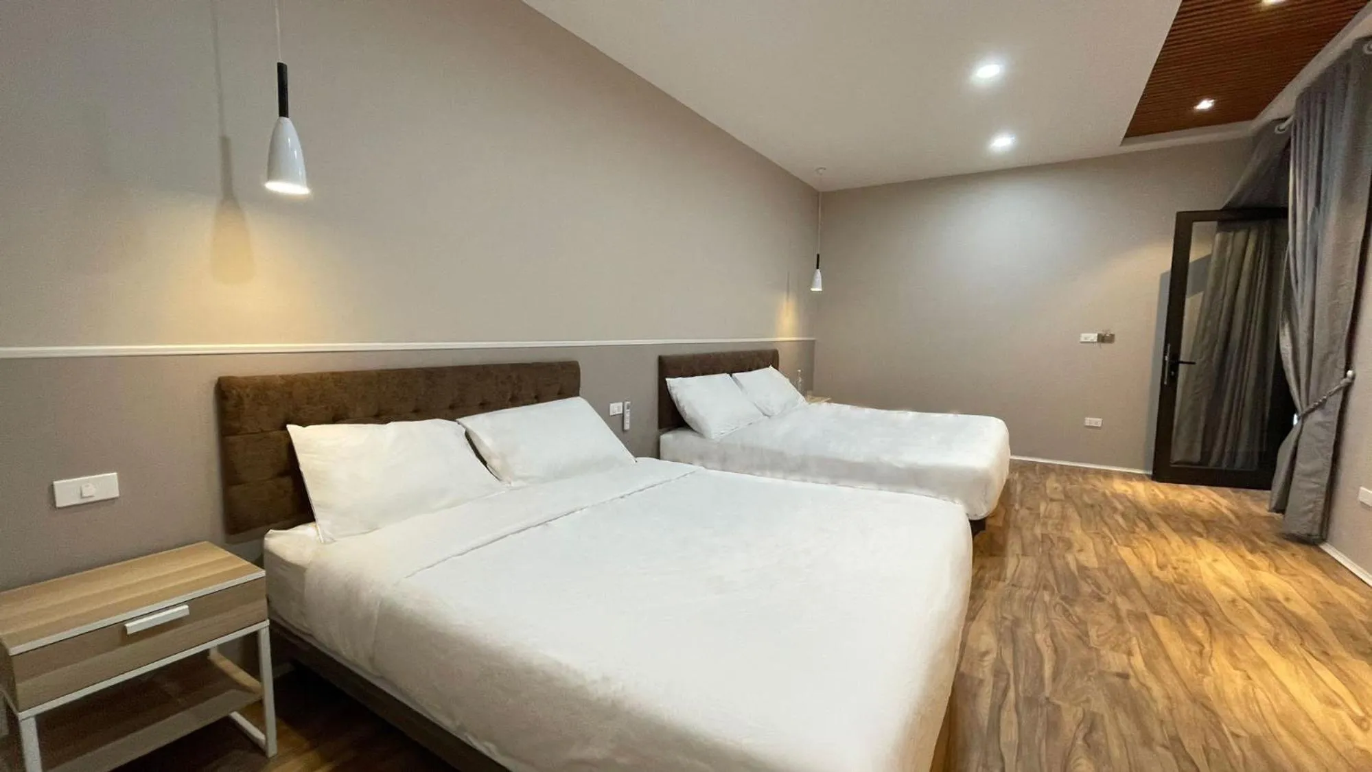 Bed in PHOENIX MINH CHÂU HOTEL