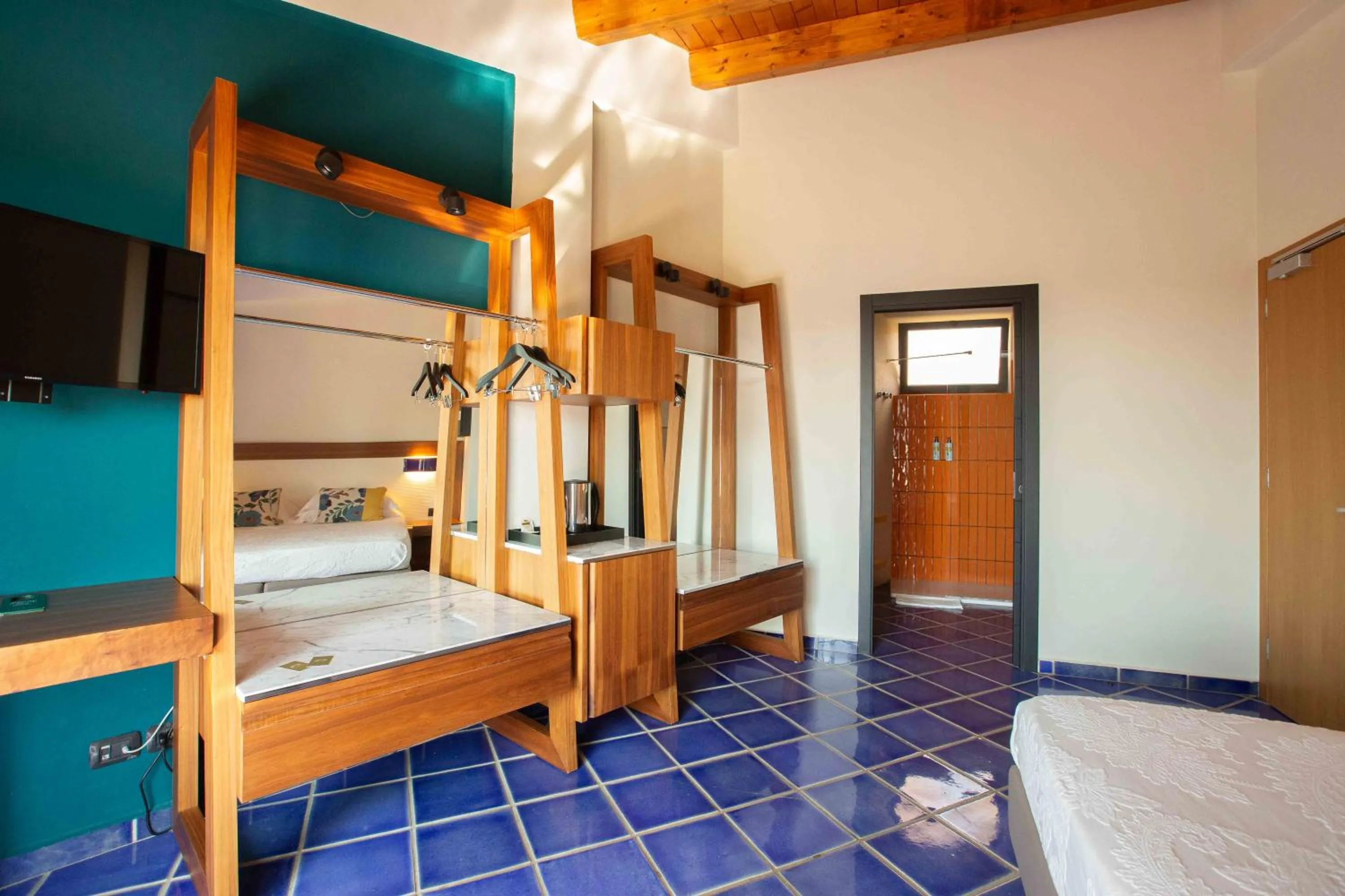 Bed in Magaggiari Hotel Resort