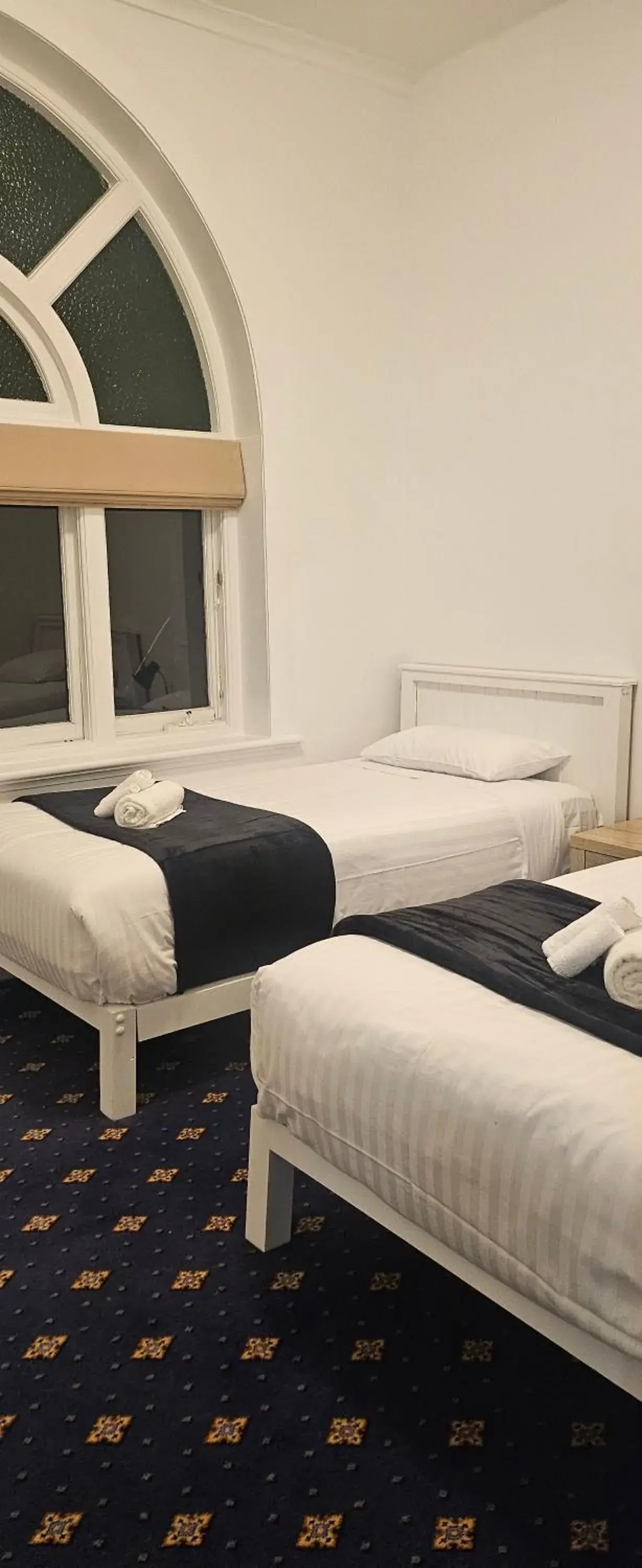 Bed in The Wharf Hotel Bed in The Wharf Hotel