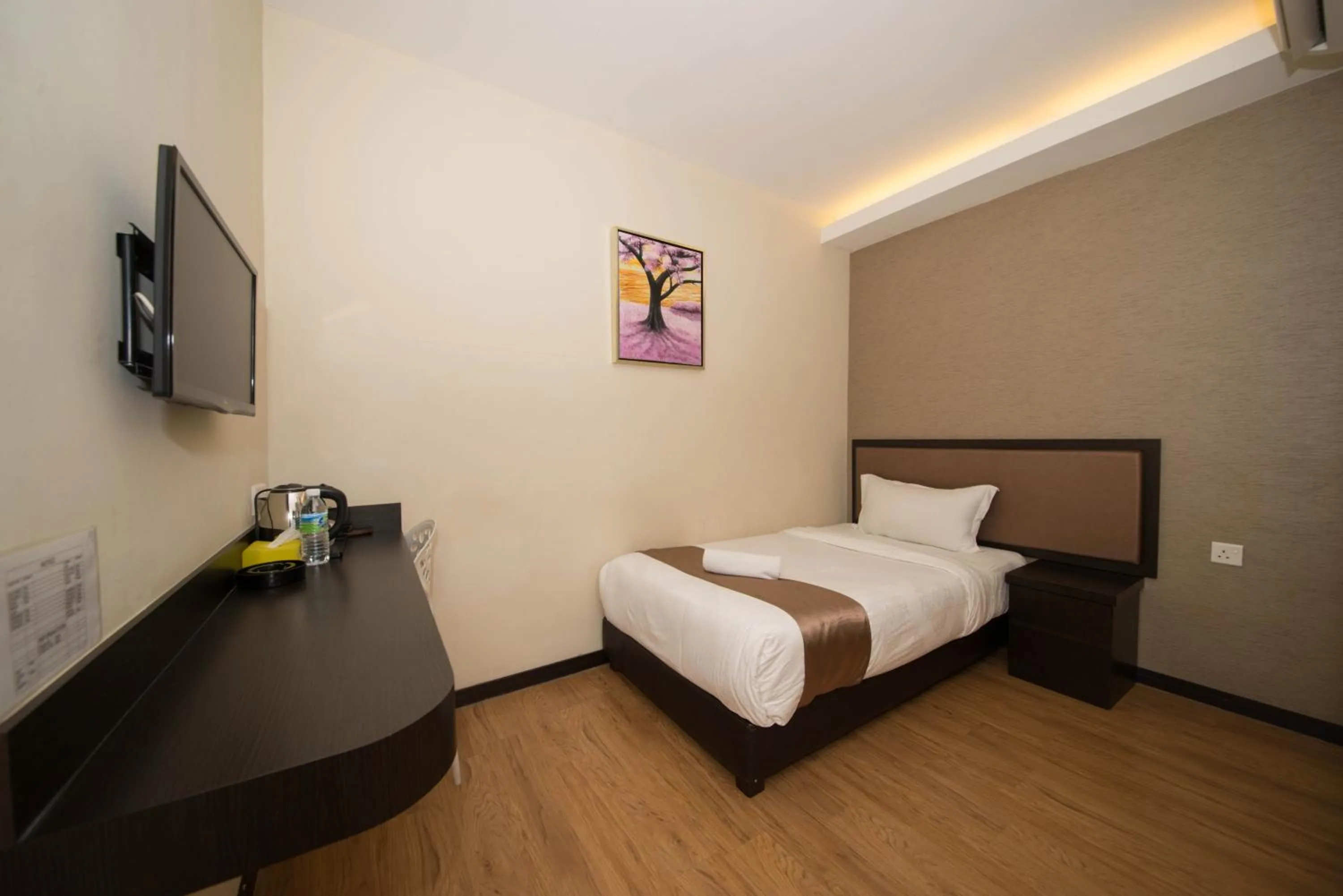 Bedroom in OYO 1214 Oro Hotel