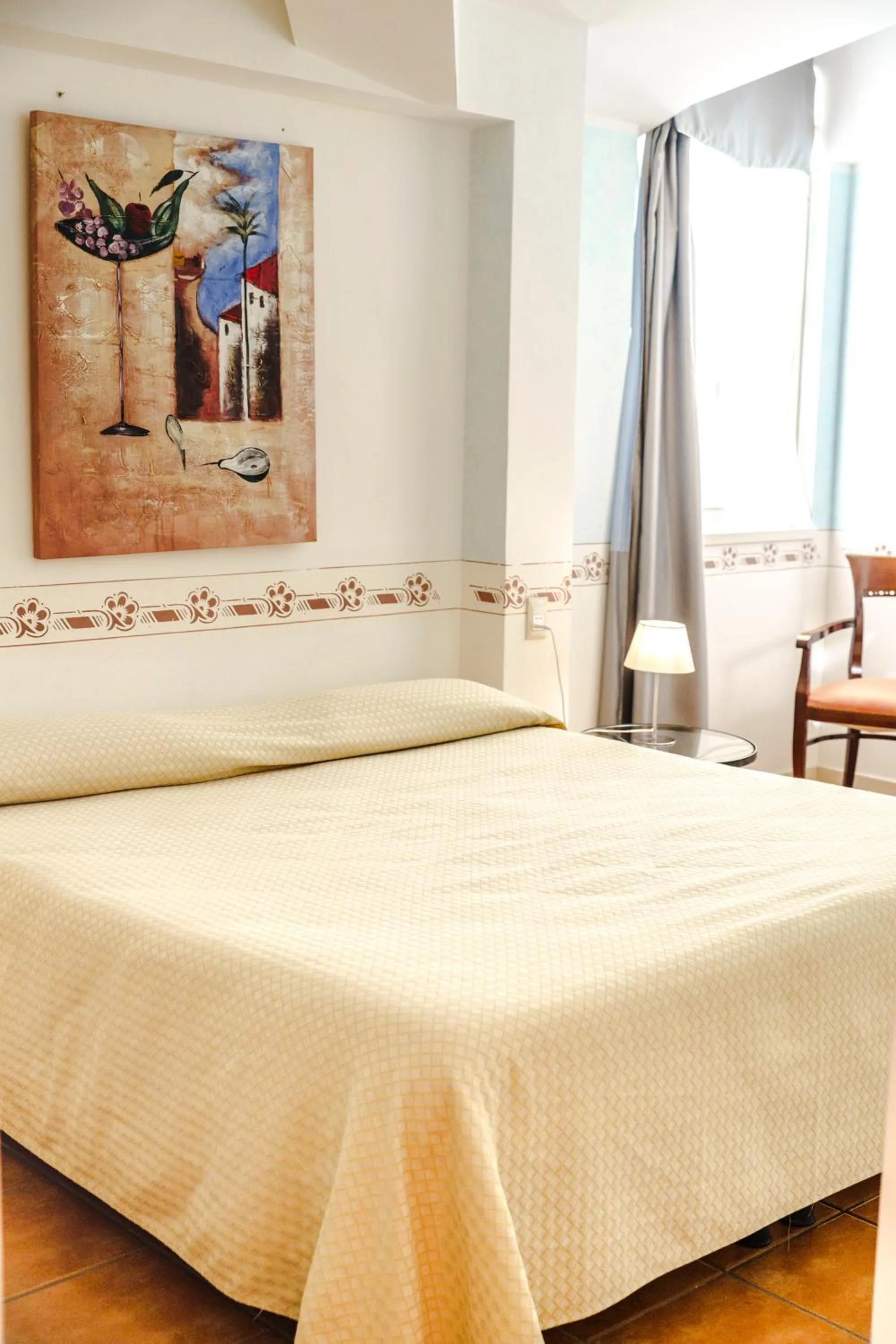 Bed in Caroline Hotel