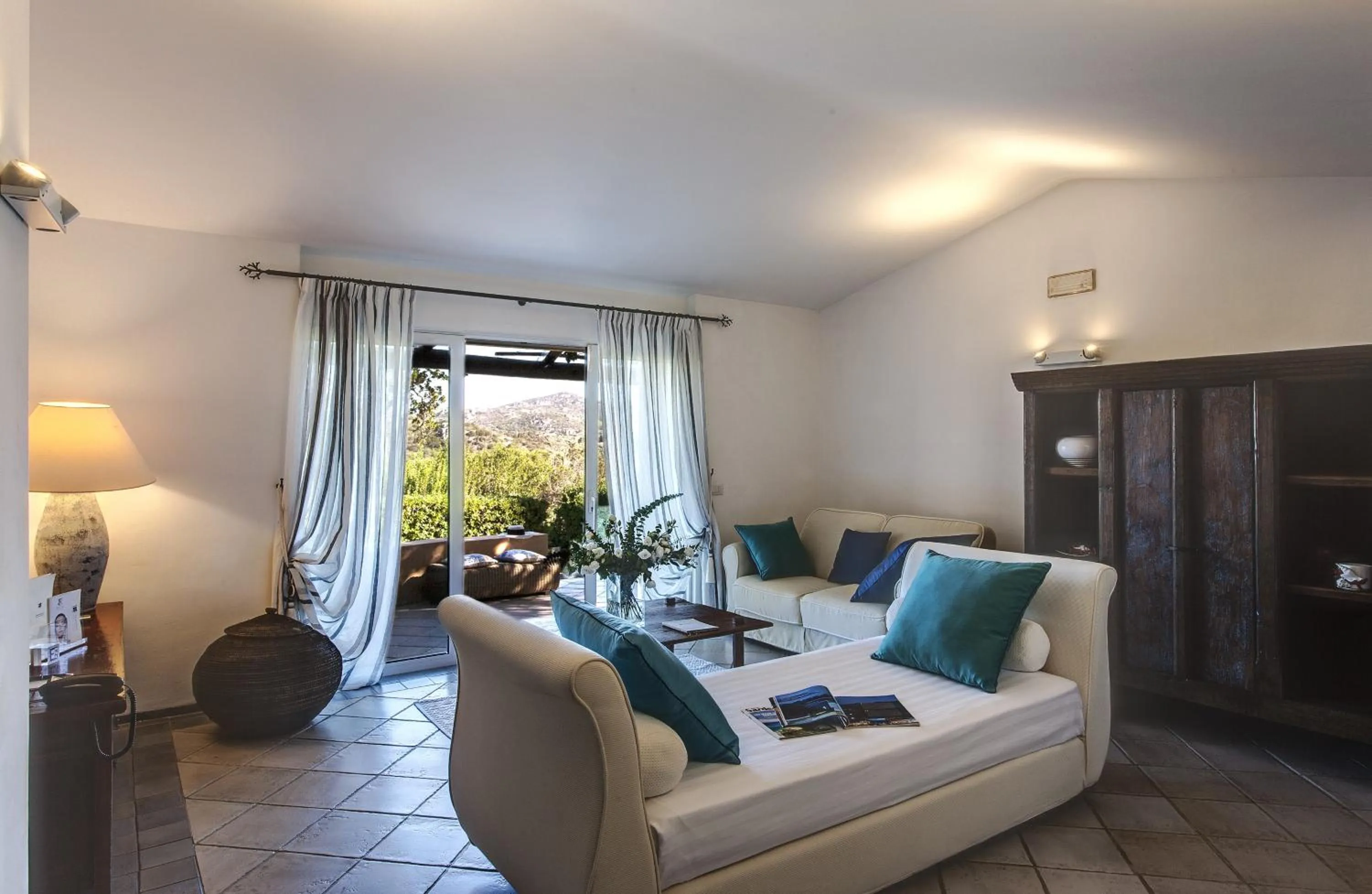 Living room, Bed in L'Ea Bianca Luxury Resort