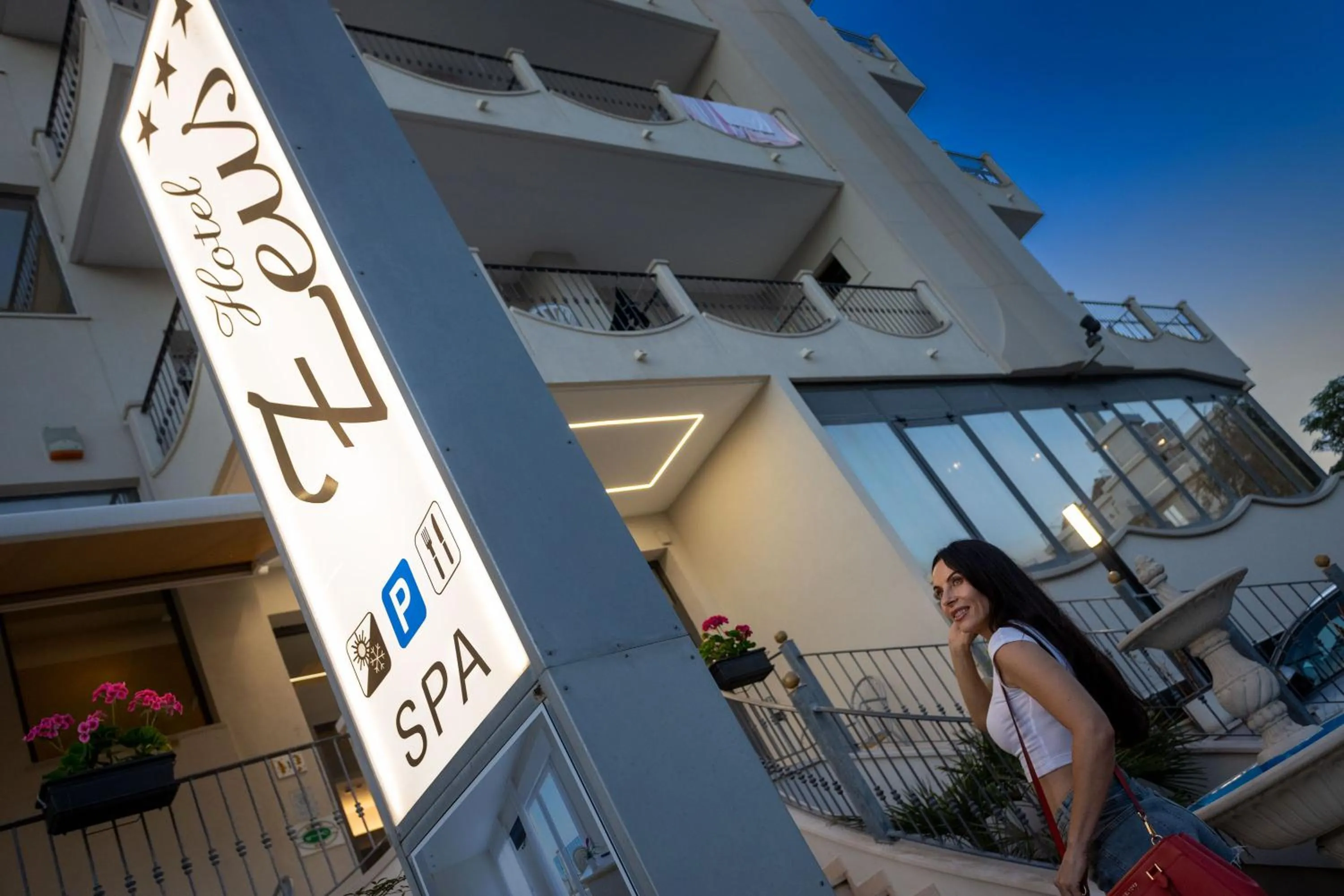 Property logo or sign in Hotel Zeus