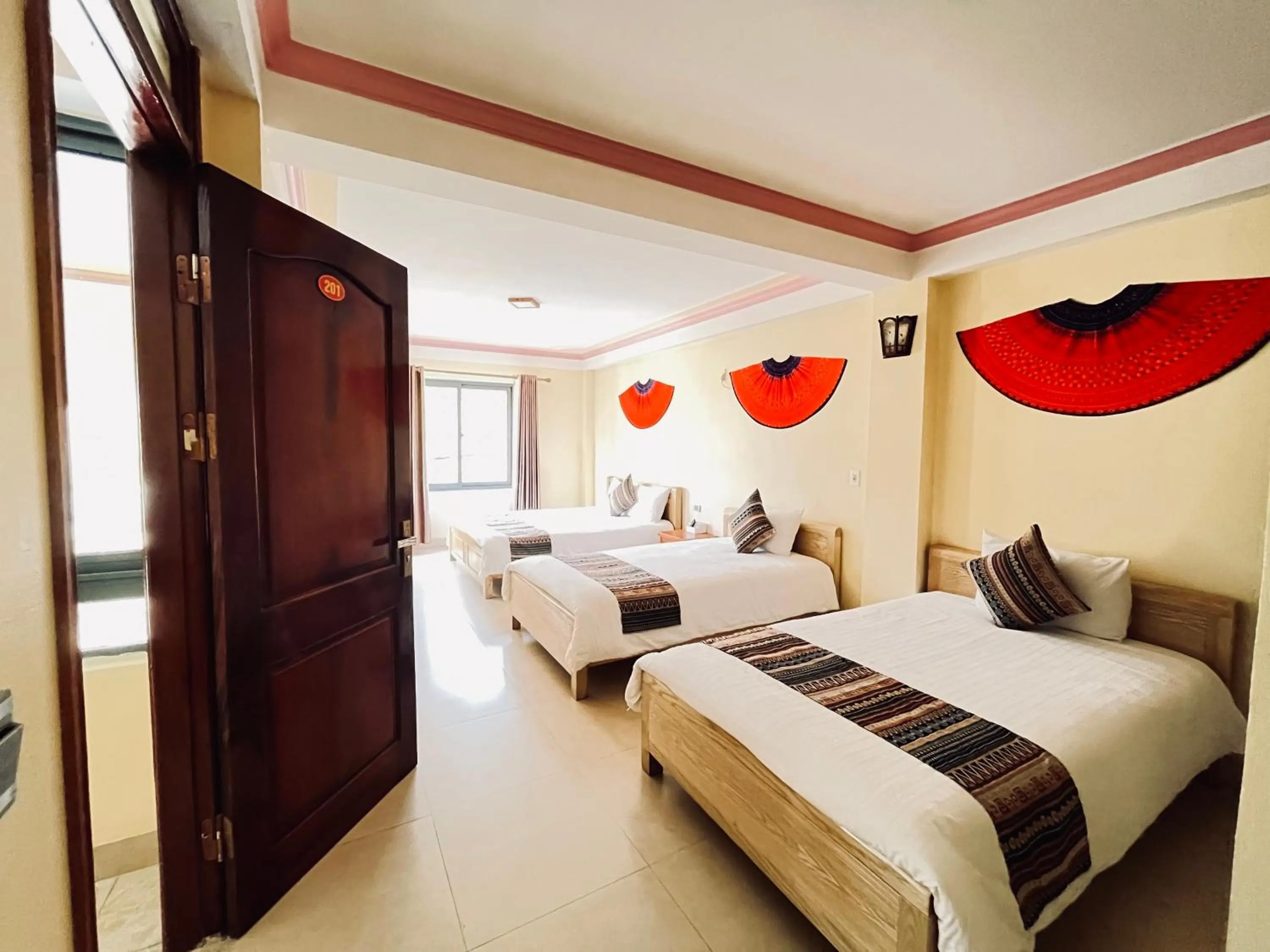 Bed in HAPPY FAMILY HOTEL