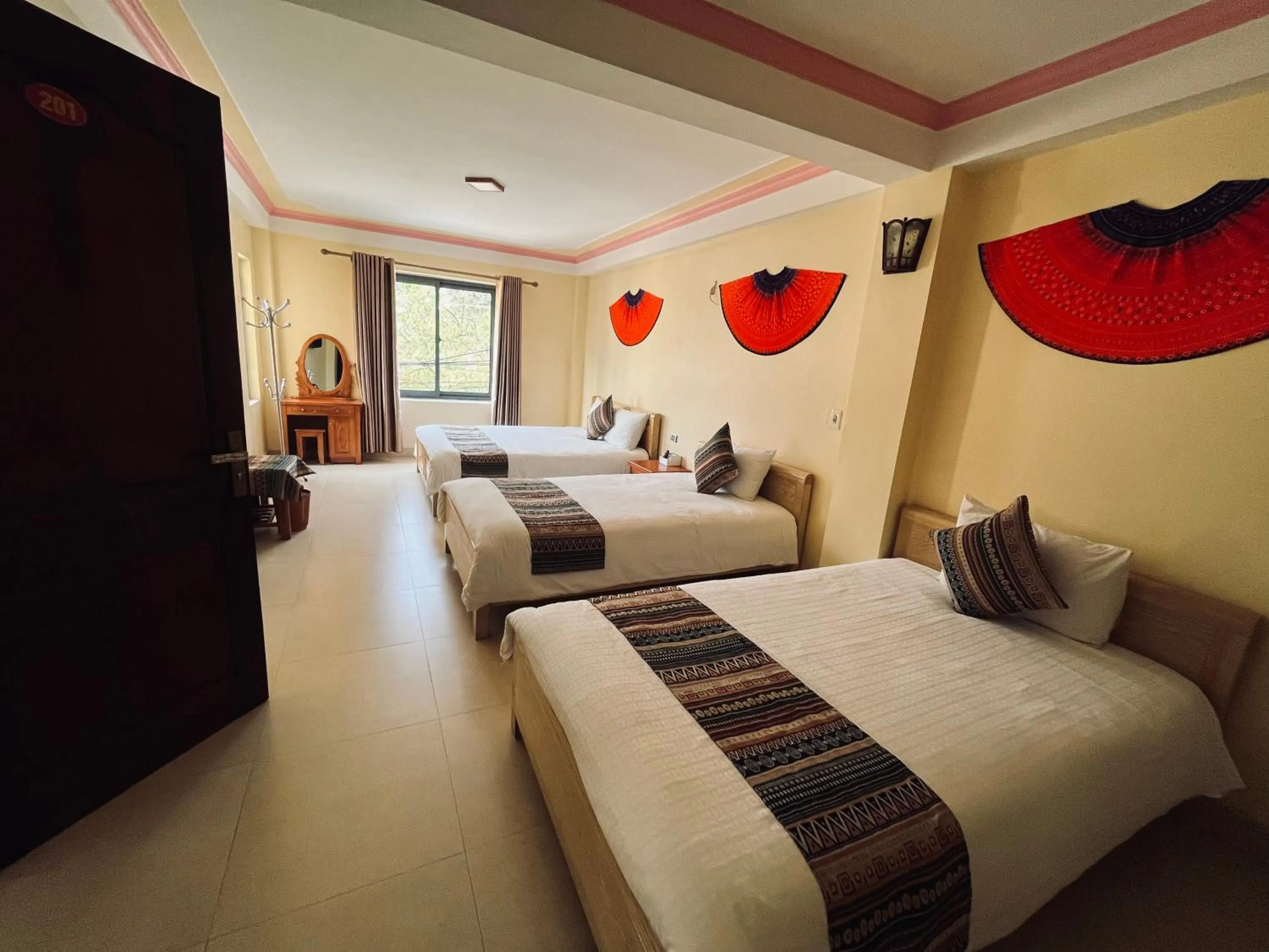 Bed in HAPPY FAMILY HOTEL