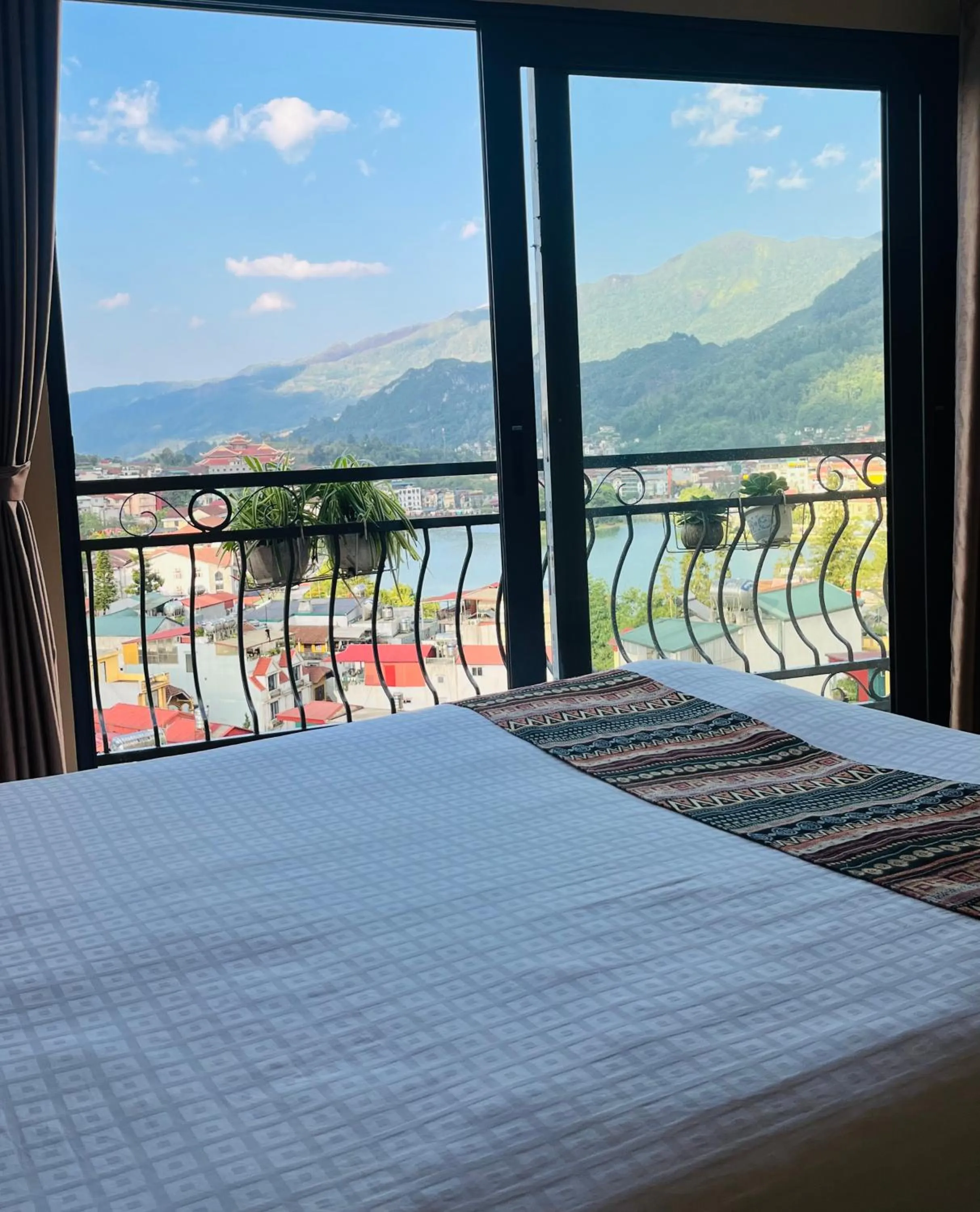 Bed in HAPPY FAMILY HOTEL