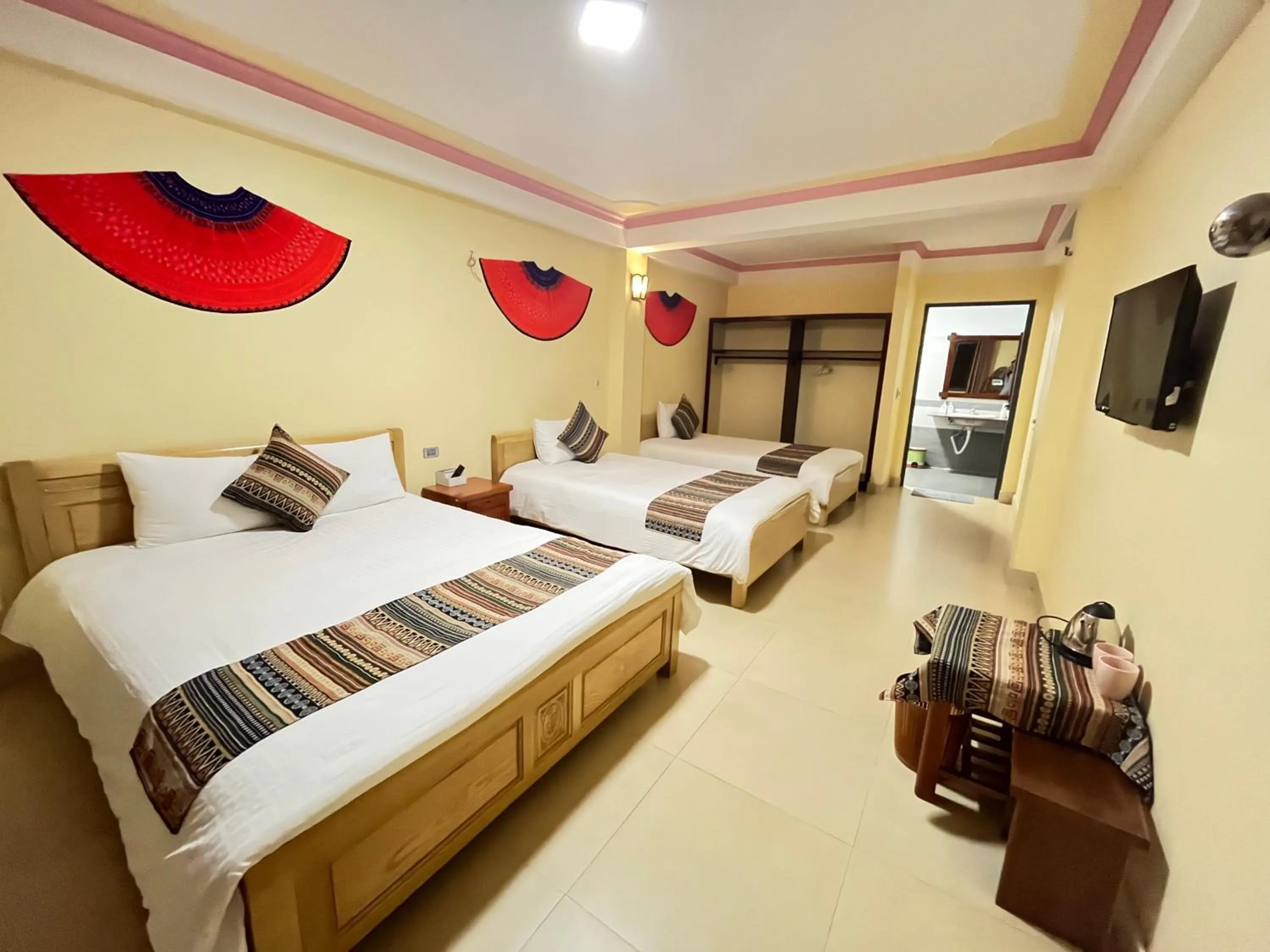 Bed in HAPPY FAMILY HOTEL