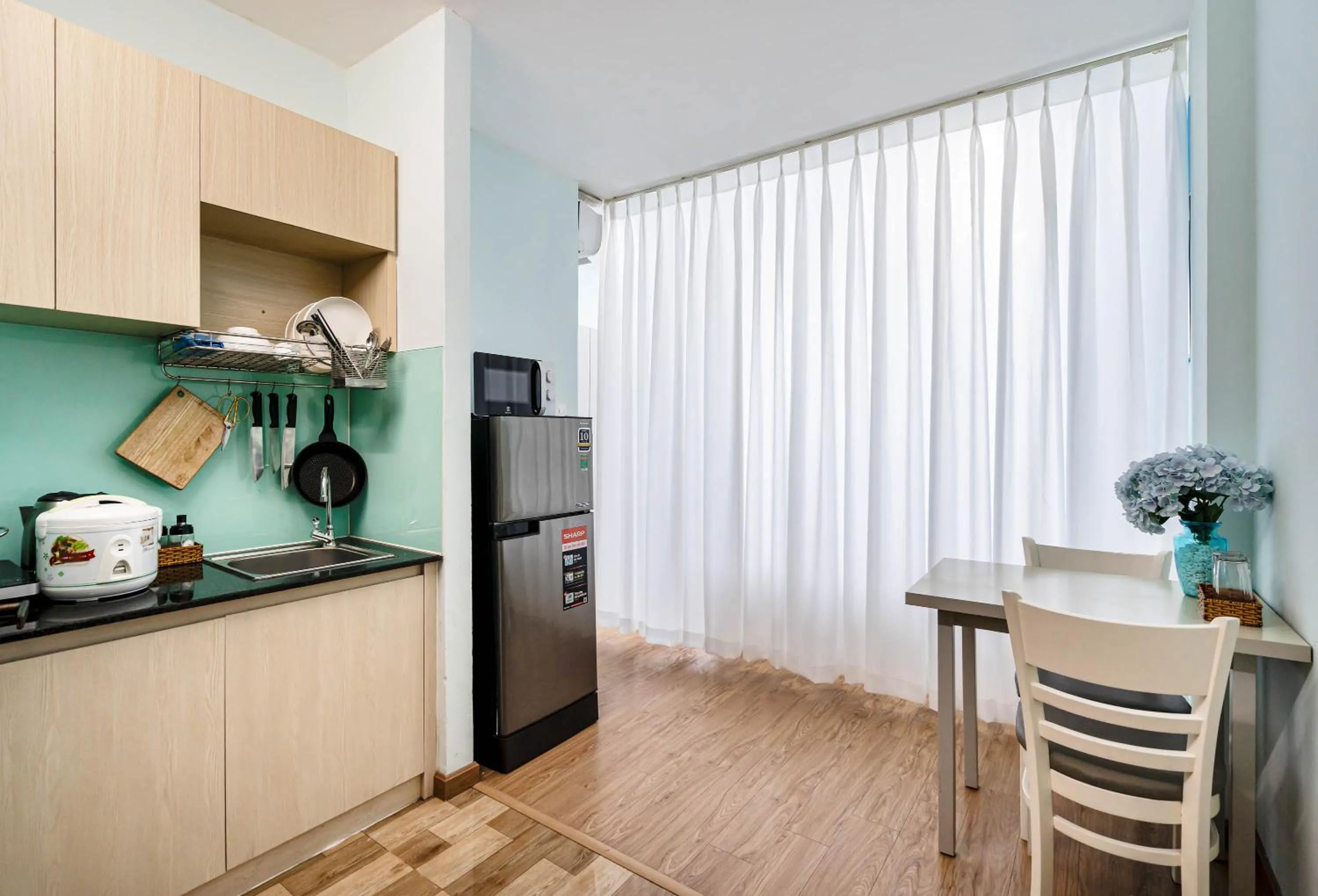 Kitchen or kitchenette in We Home Nguyen Trai