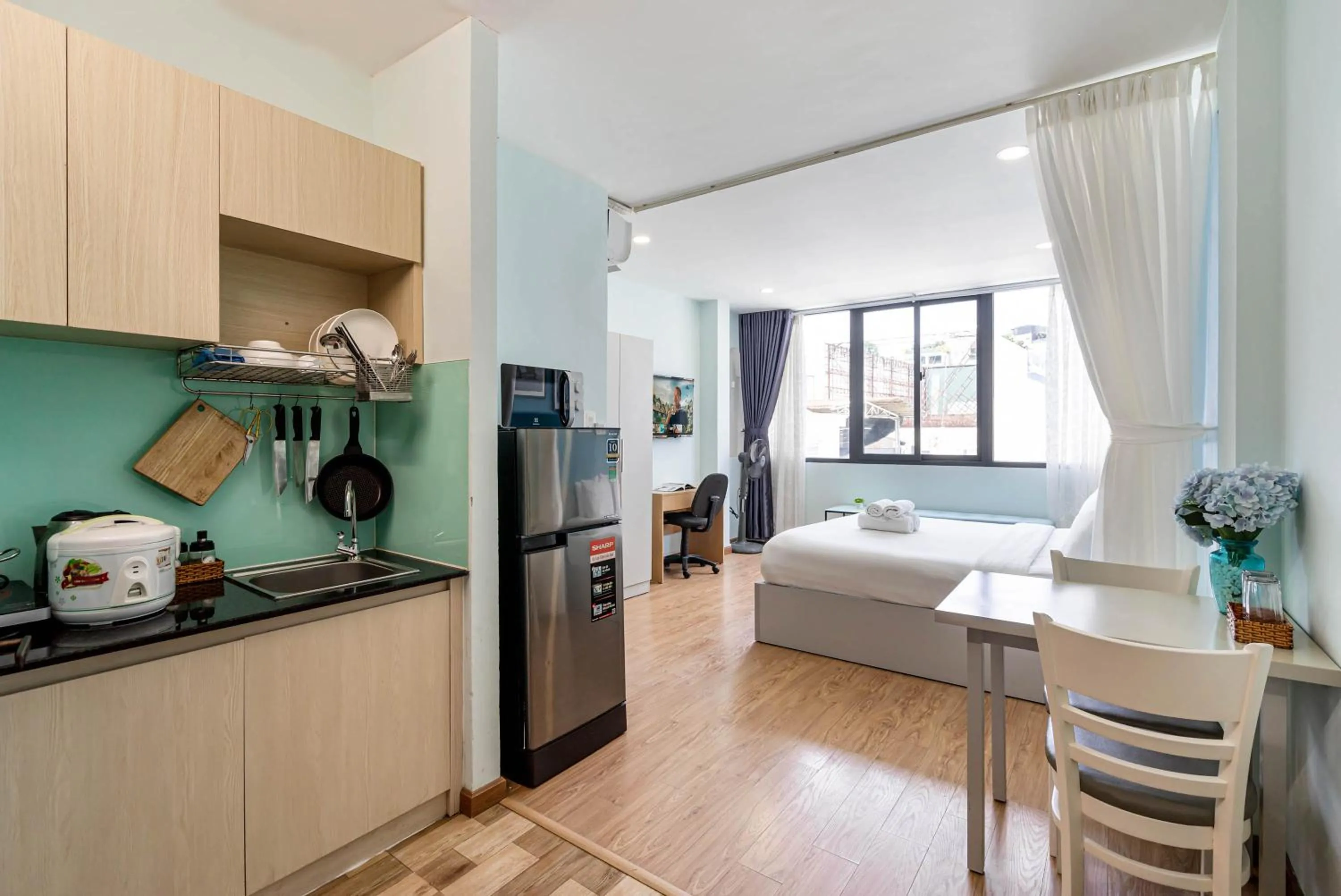 Kitchen or kitchenette, Bed in We Home Nguyen Trai