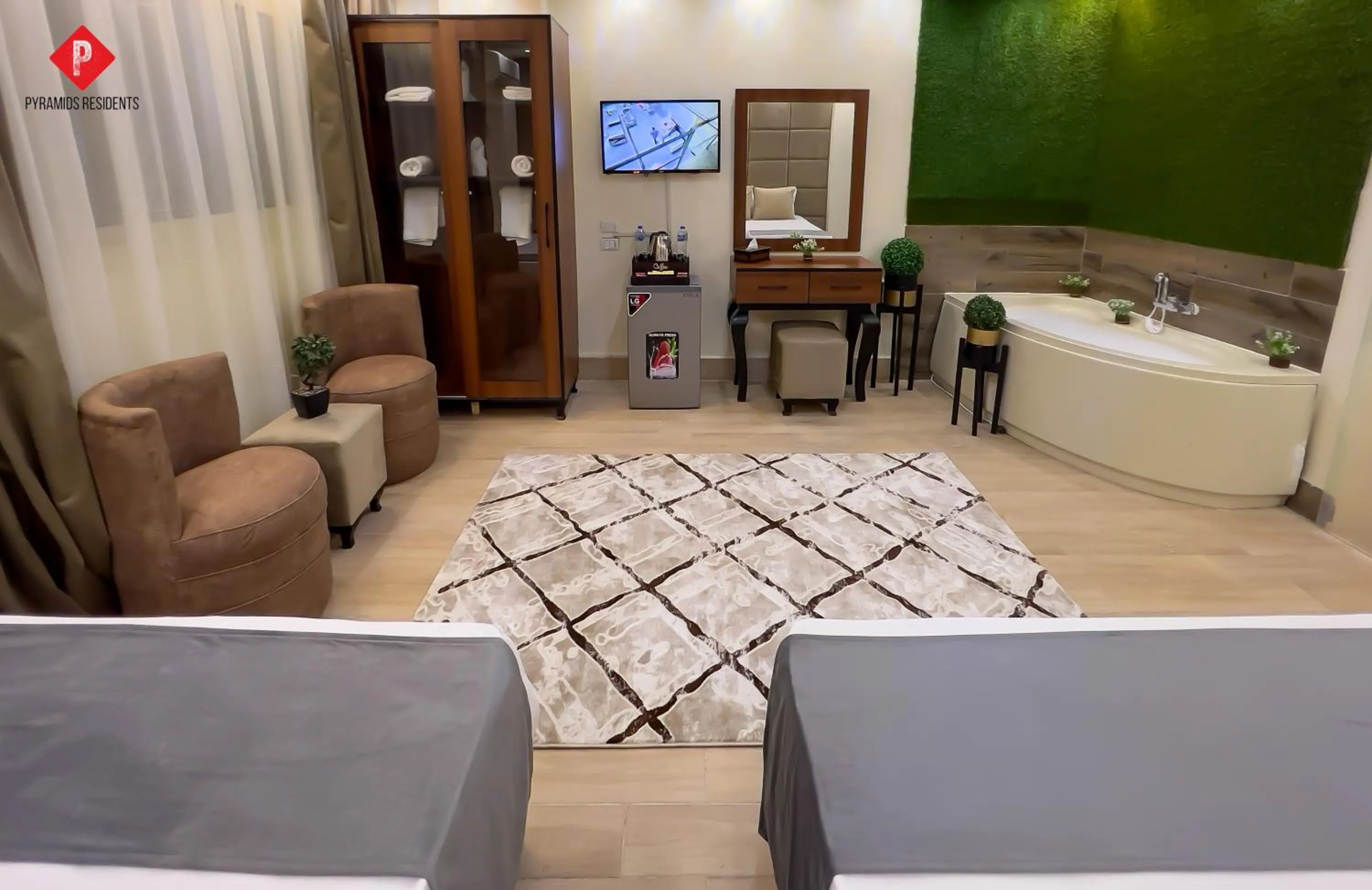 Bed in Pyramids View Guest House