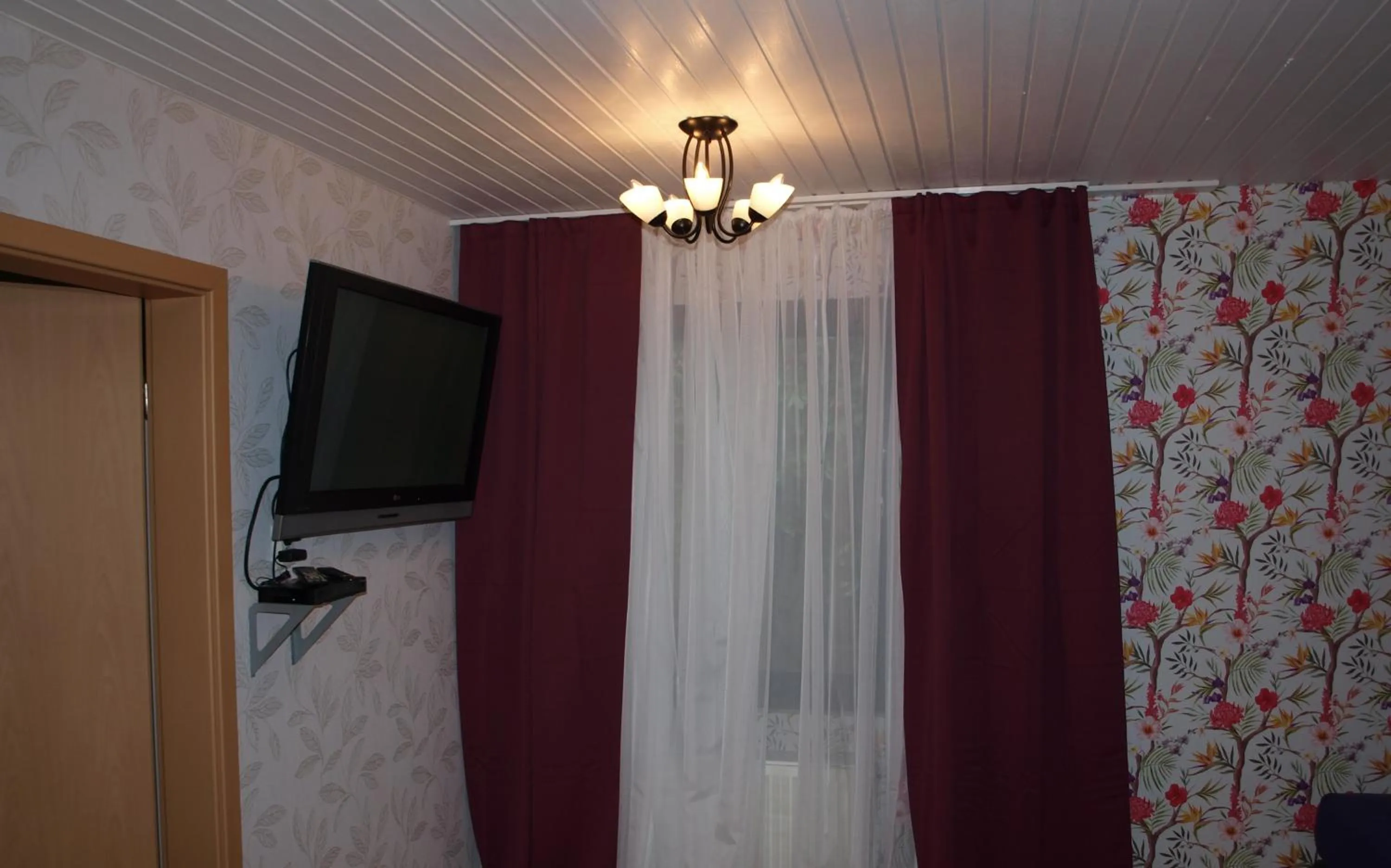 Communal lounge/ TV room in Waldhotel Lemberg