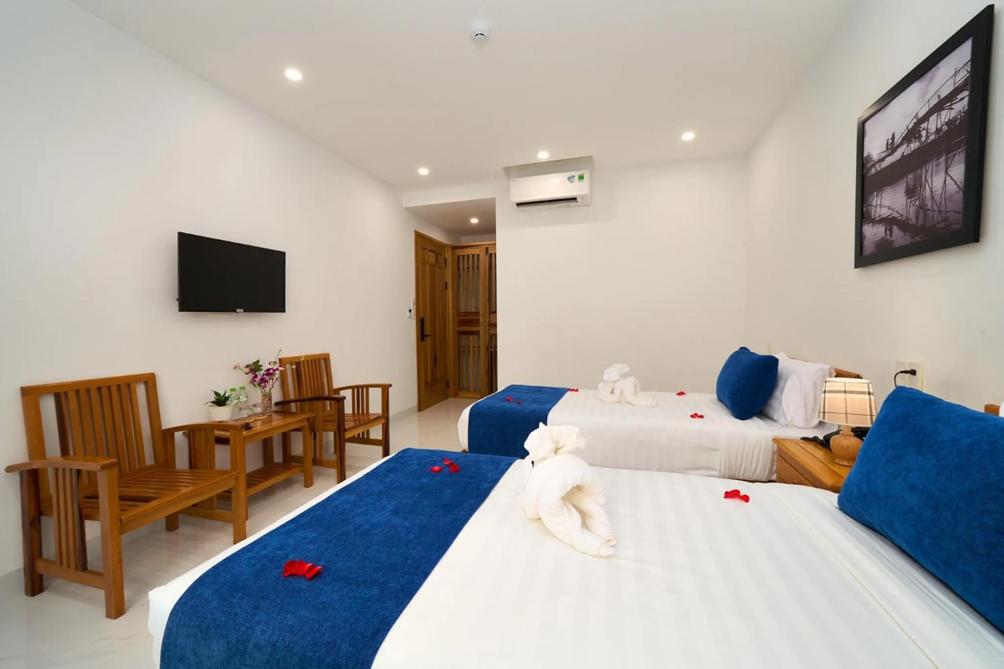 Communal lounge/ TV room, Bed in Hoi An Legend Charm Boutique Hoi An Hotel