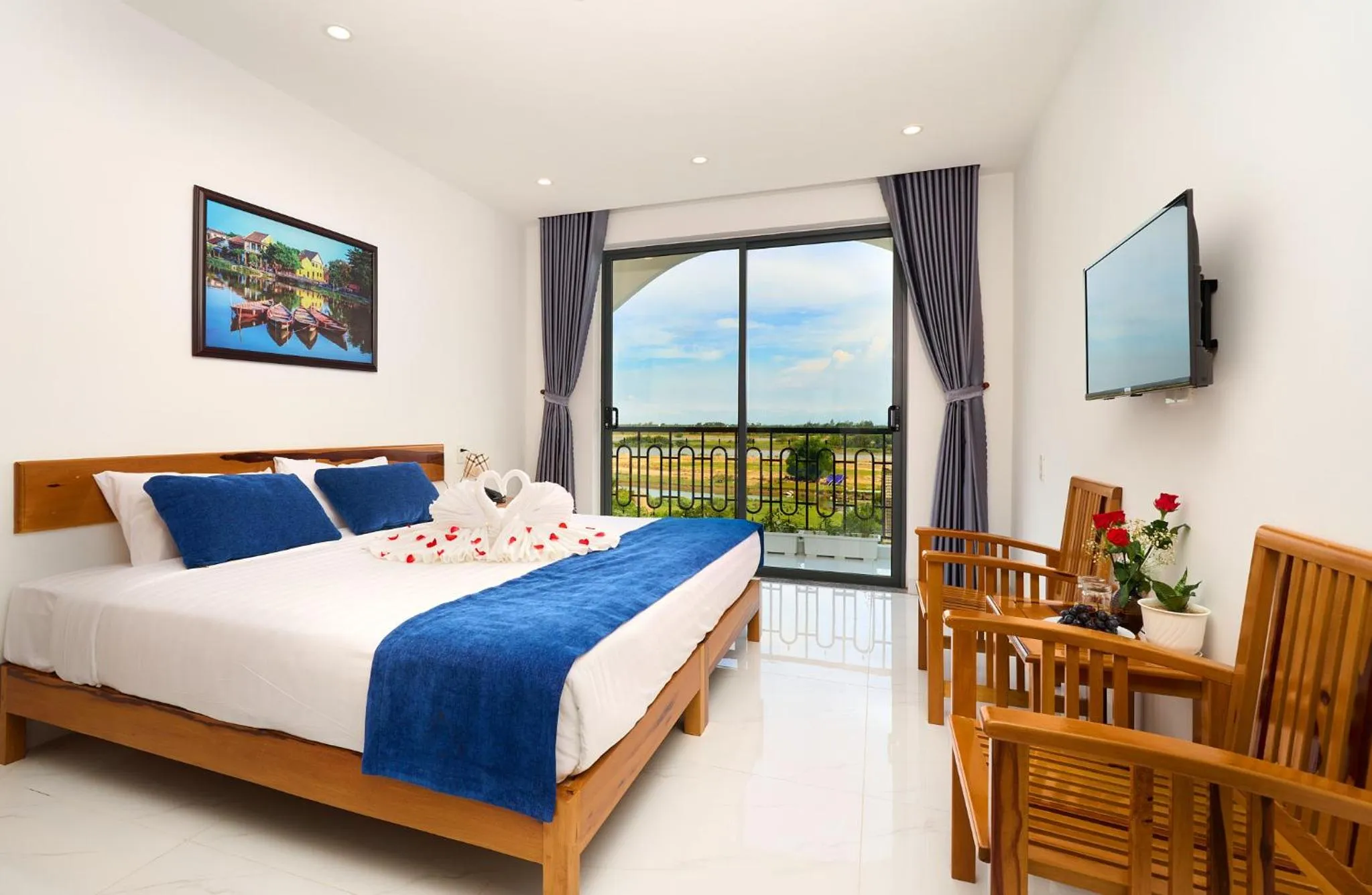 Communal lounge/ TV room, Bed in Hoi An Legend Charm Boutique Hoi An Hotel