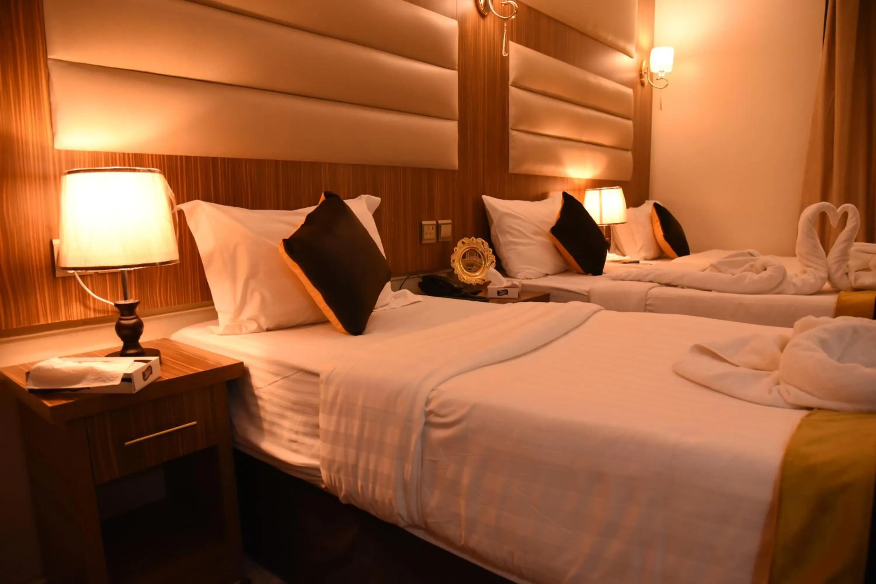 Bed in فندق قصر الاندلس الذهبي - Alandalus golden palace Hotel