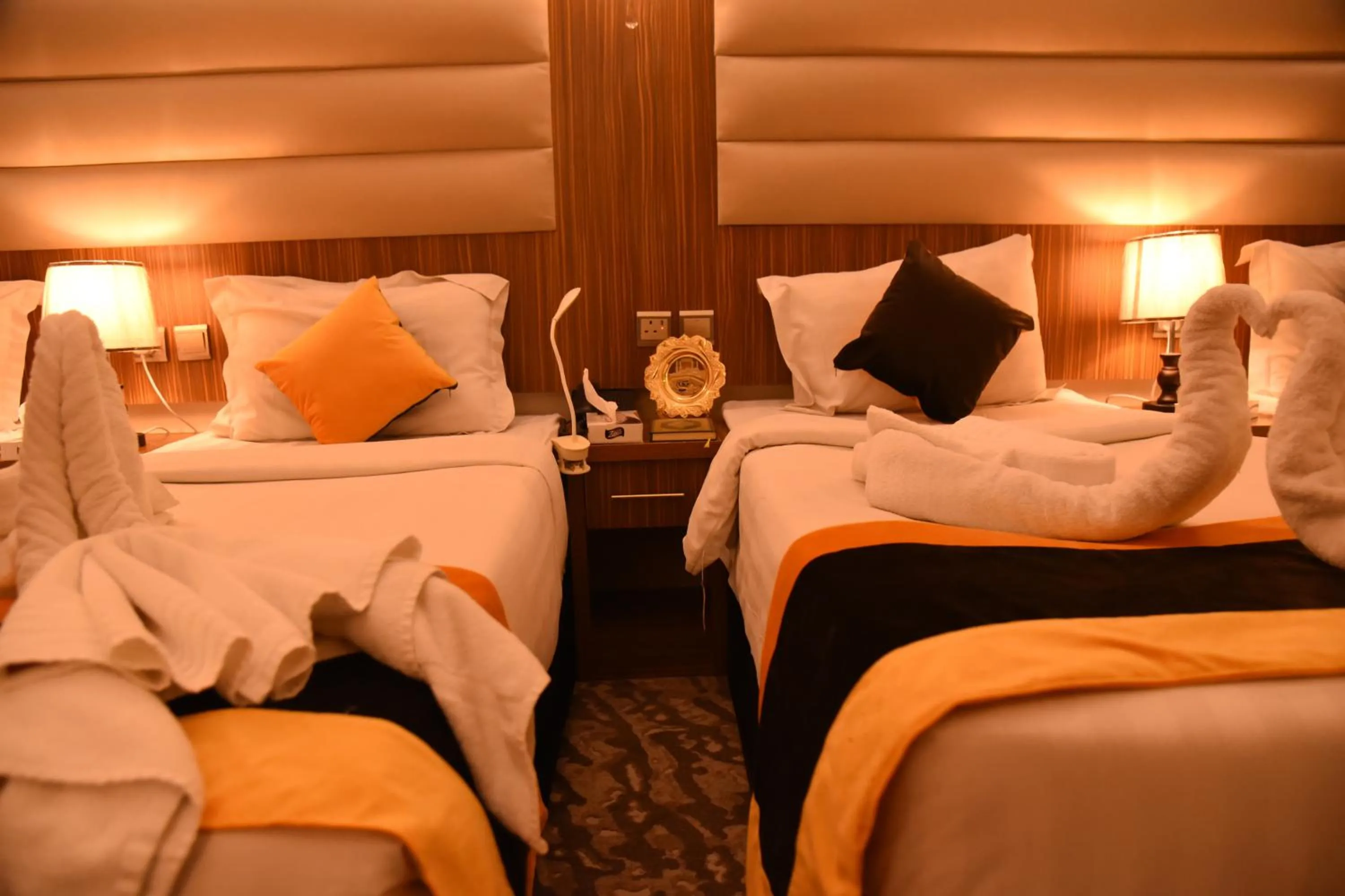 Bed in فندق قصر الاندلس الذهبي - Alandalus golden palace Hotel