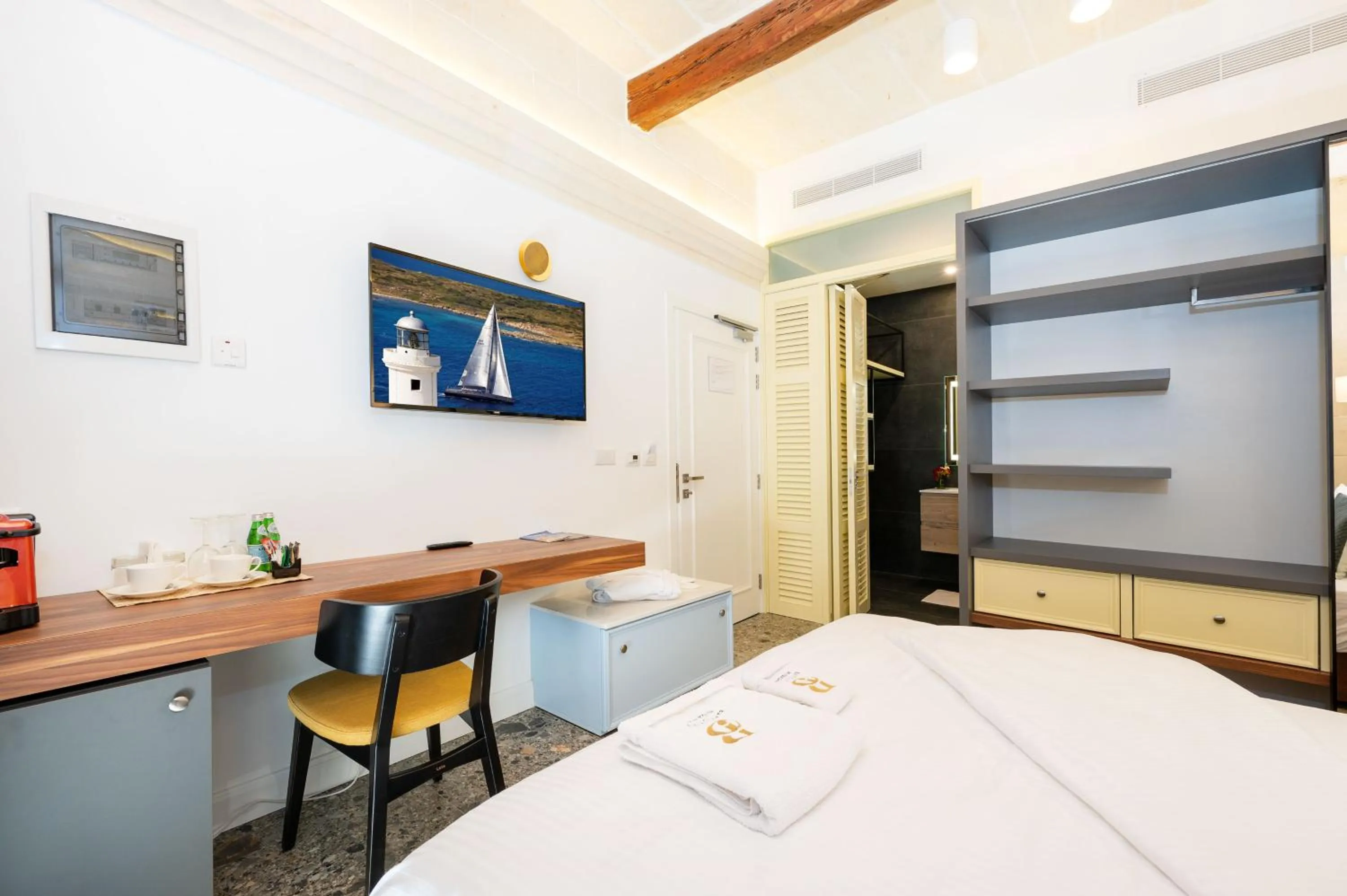 wardrobe, Bed in Battistini Boutique Living and Spa, Victoria, Gozo